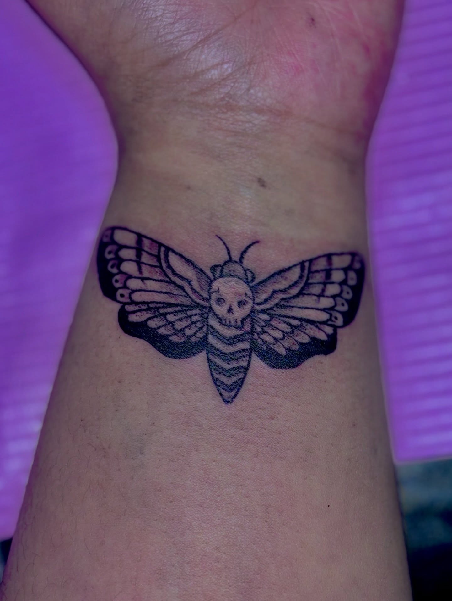 Death's-head moth black and grey tattoo on the forearm by Tessahwessah 🧞‍♀️