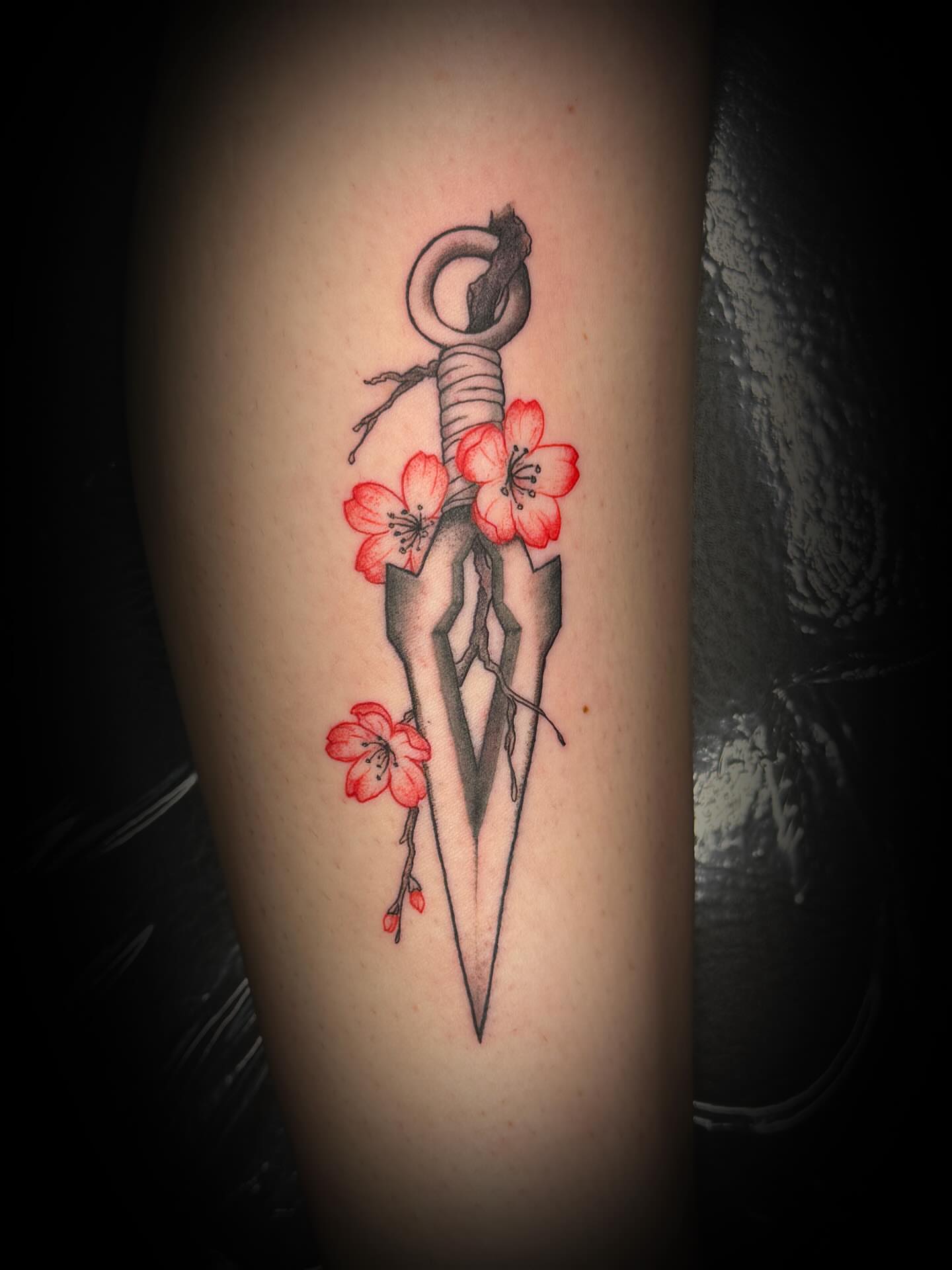 Cherry blossom sword dotwork tattoo on the forearm by sᴋᴇᴛᴄʜᴇᴅ