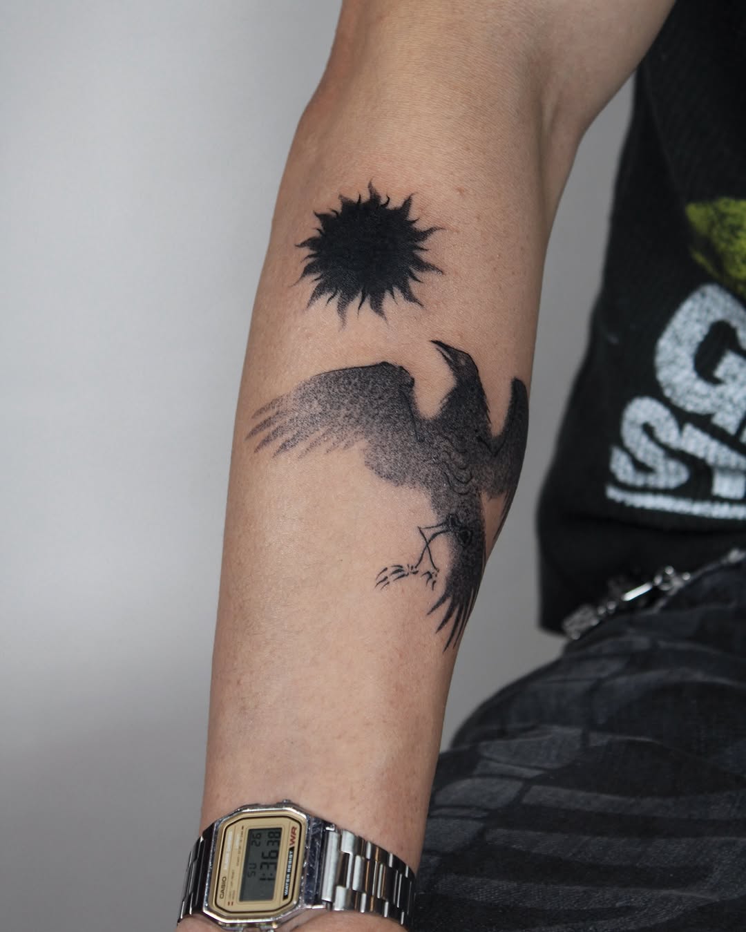 Bird and sun fine line tattoo on the forearm by Piao