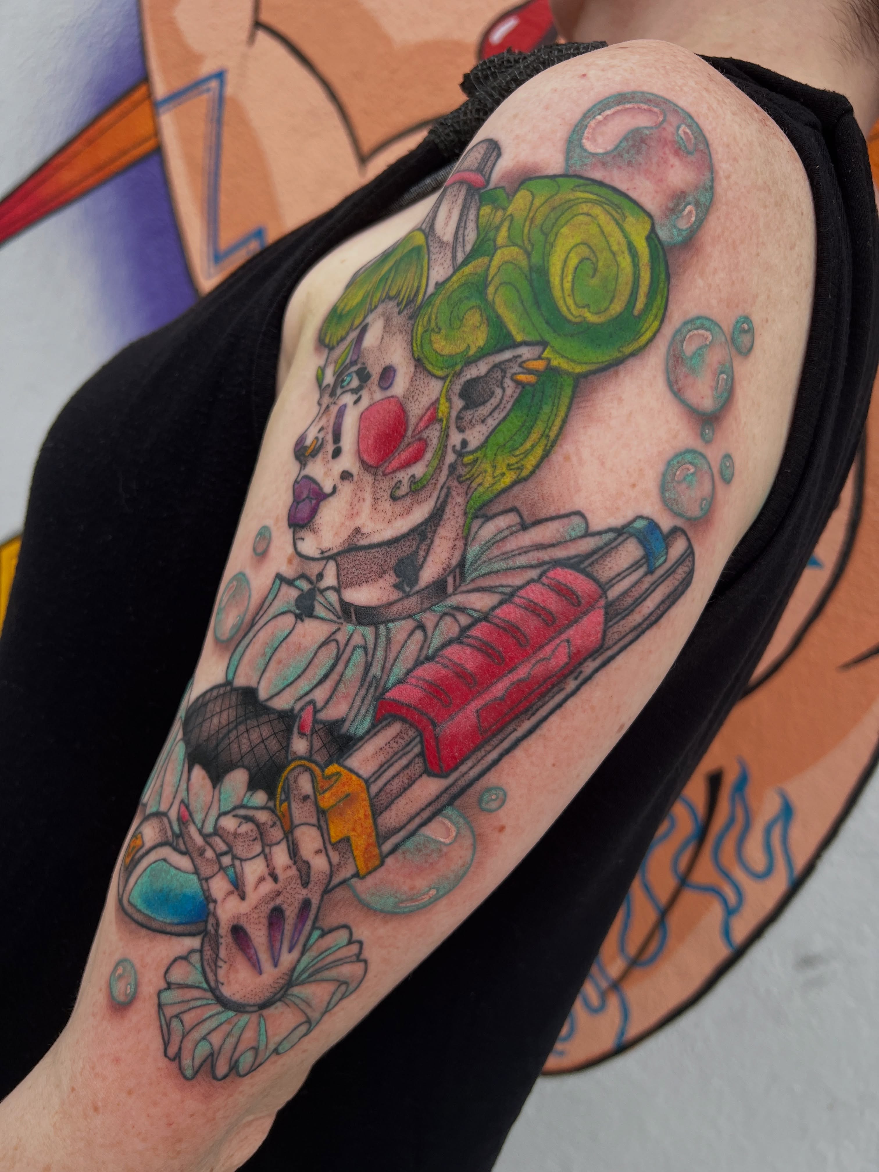 Clown with roller skates American traditional tattoo on the forearm by Owen Smith -OEOS- SF