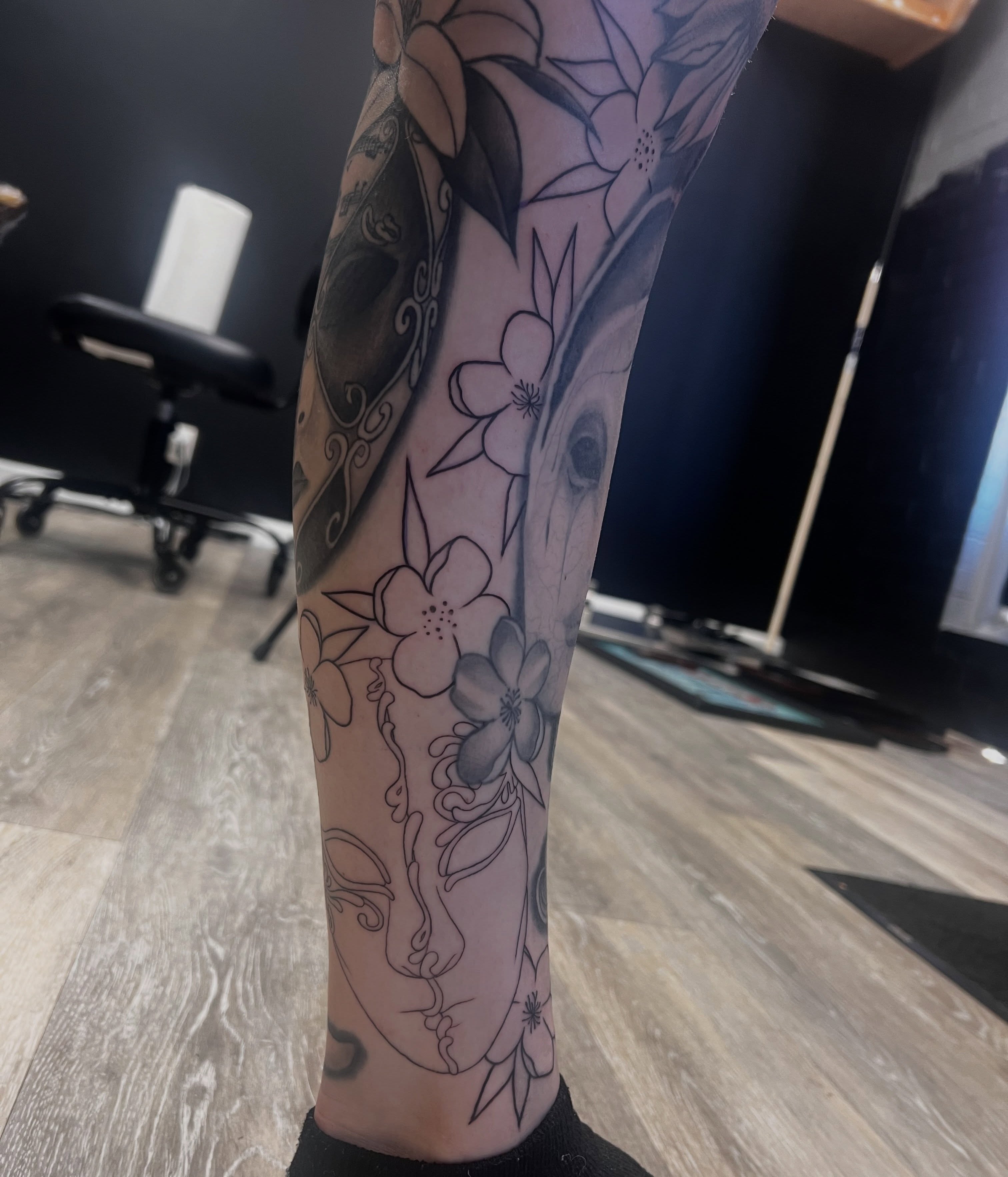 Floral design black and grey tattoo on the forearm by Olivia Suzanne Fada