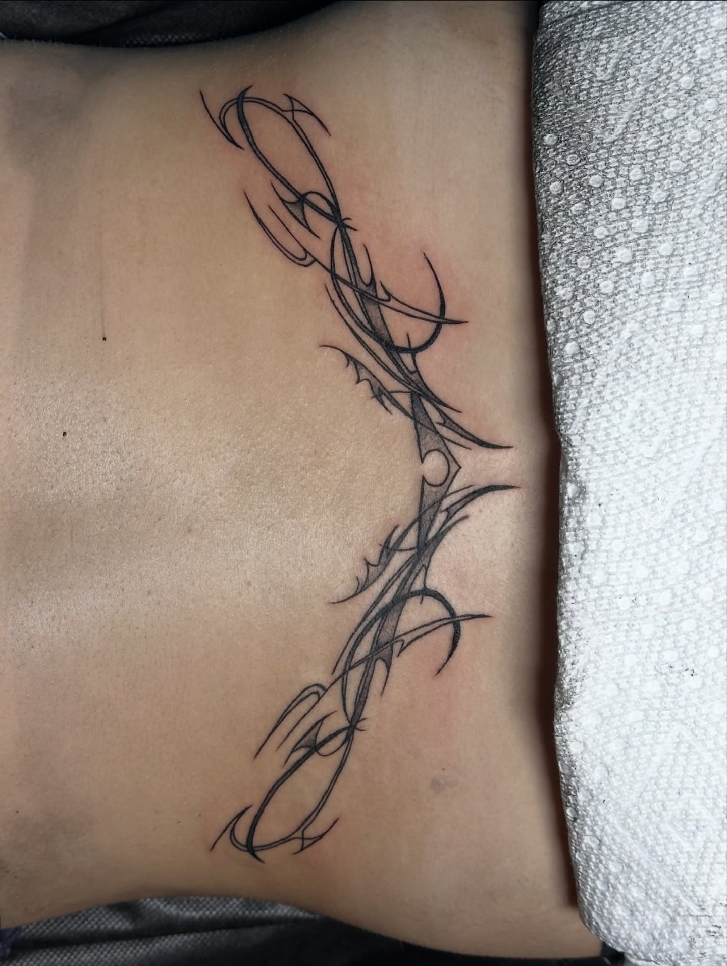 Tattoo by @gabby_la_piercer — black_and_grey, tribal