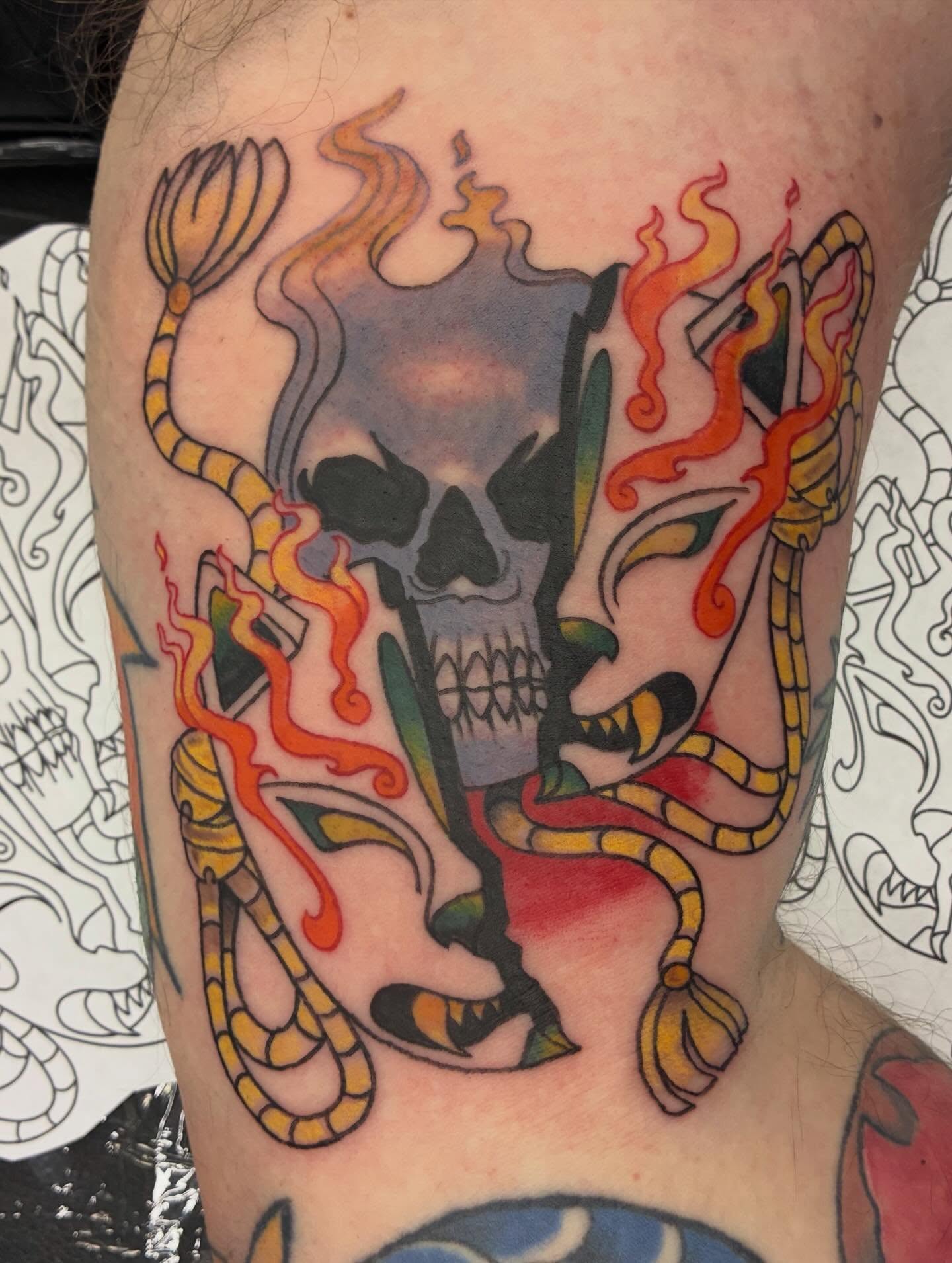 Skull with flames American traditional tattoo on the thigh by Hit & Run Tattoo, Dayton, Ohio