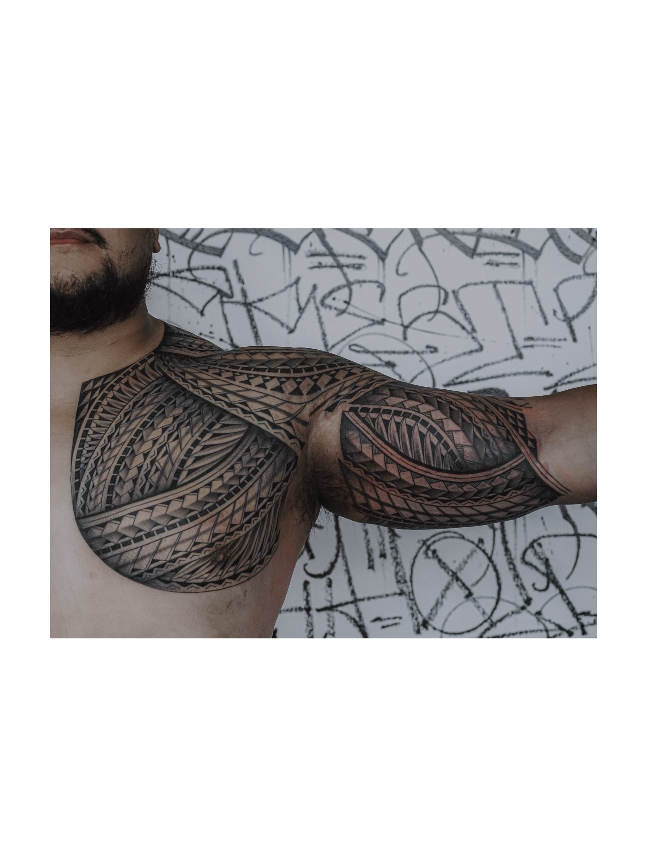 Tribal pattern tribal tattoo on the chest by TATTOOS by DESMOND