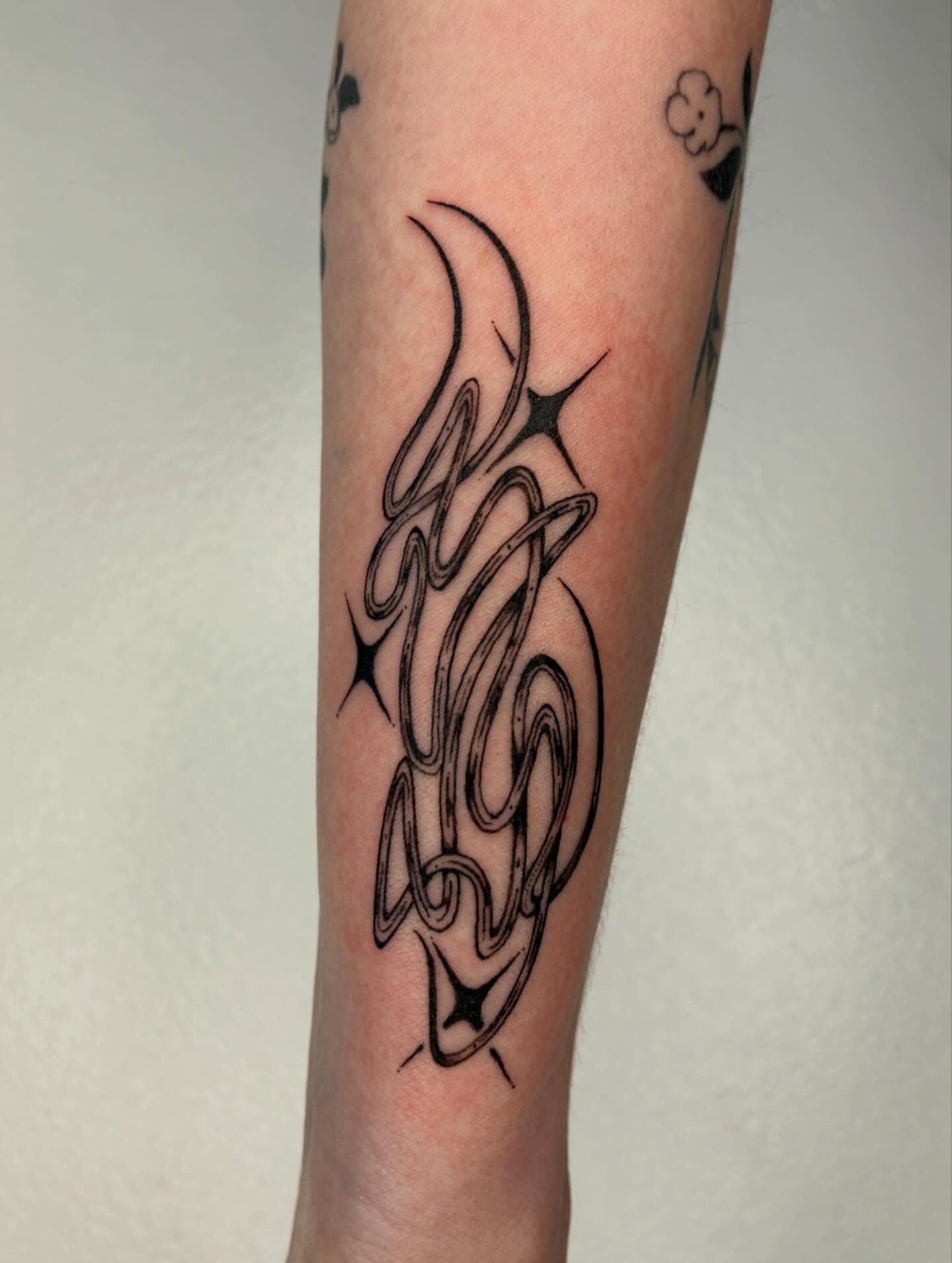 Arabic calligraphy black and grey tattoo on the forearm by Steven Sessler, San Francisco, California
