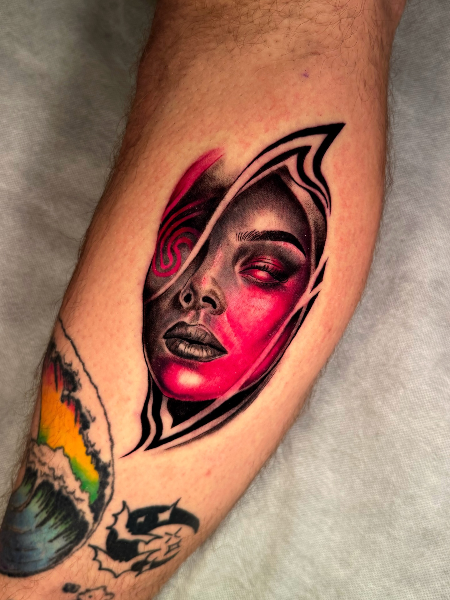 Woman's face realism tattoo on the forearm by Ericka Hampton, Ferndale, Michigan