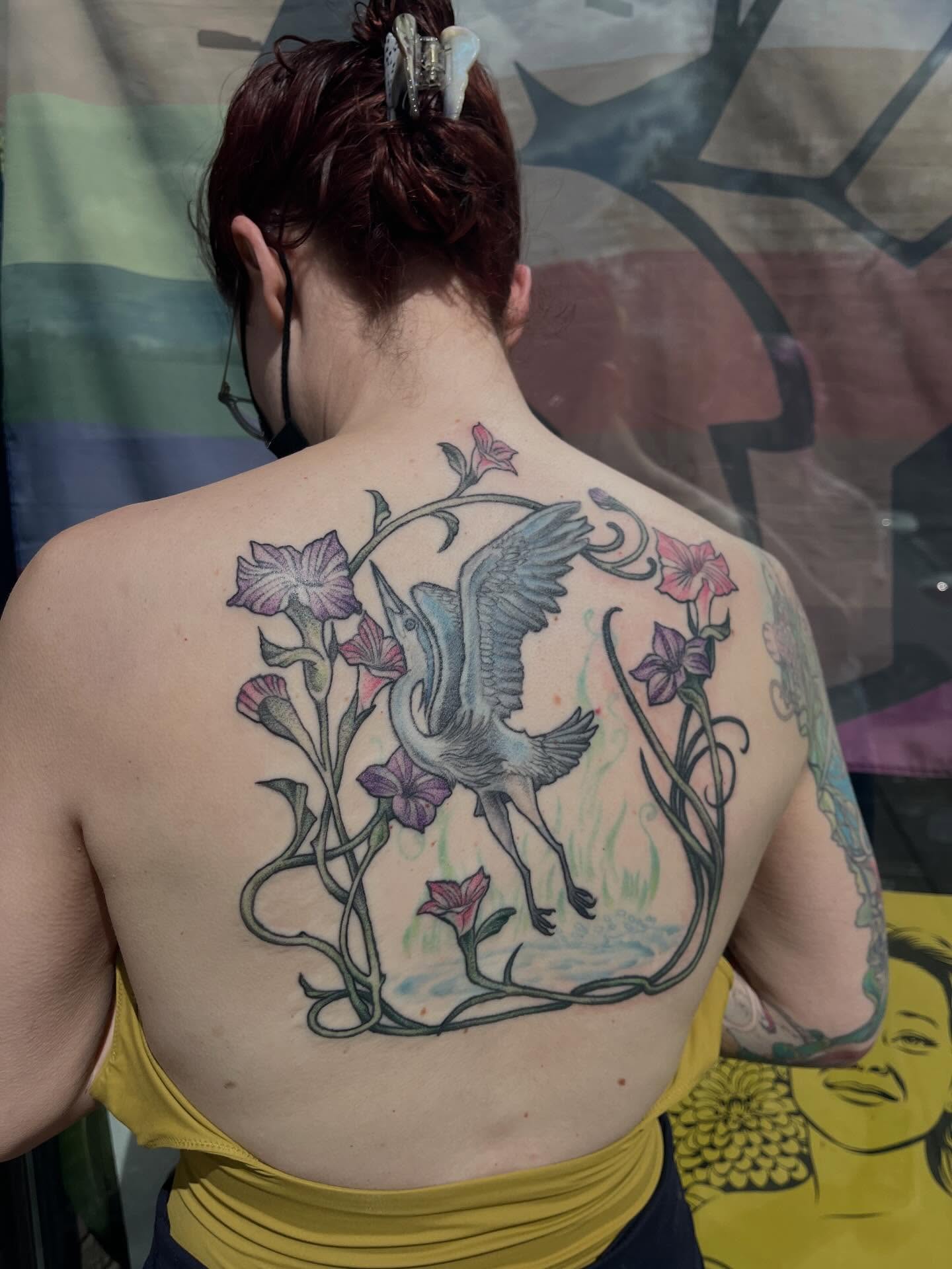 Heron and flowers illustrative tattoo on the back by bunny, Minneapolis, Minnesota