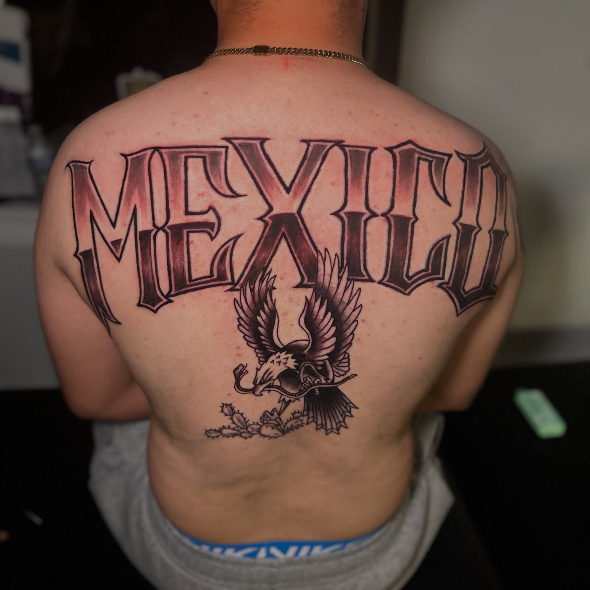 Mexico black and grey tattoo on the back by Joe 💭👁