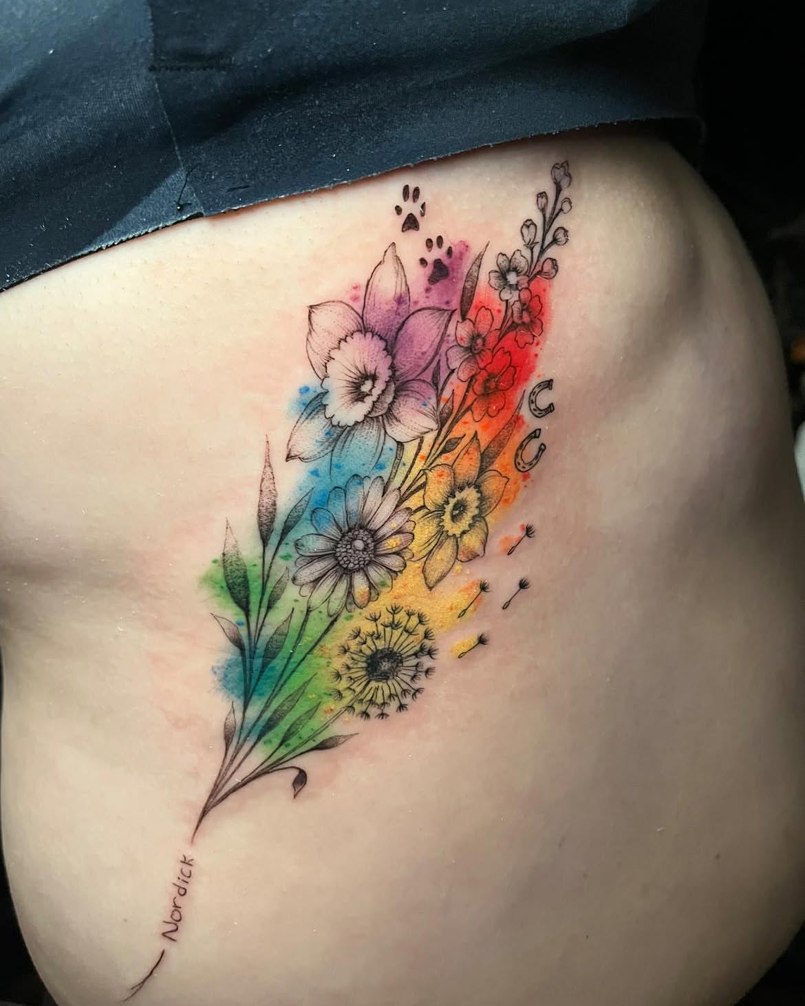 Flower bouquet watercolor tattoo on the thigh by SJ