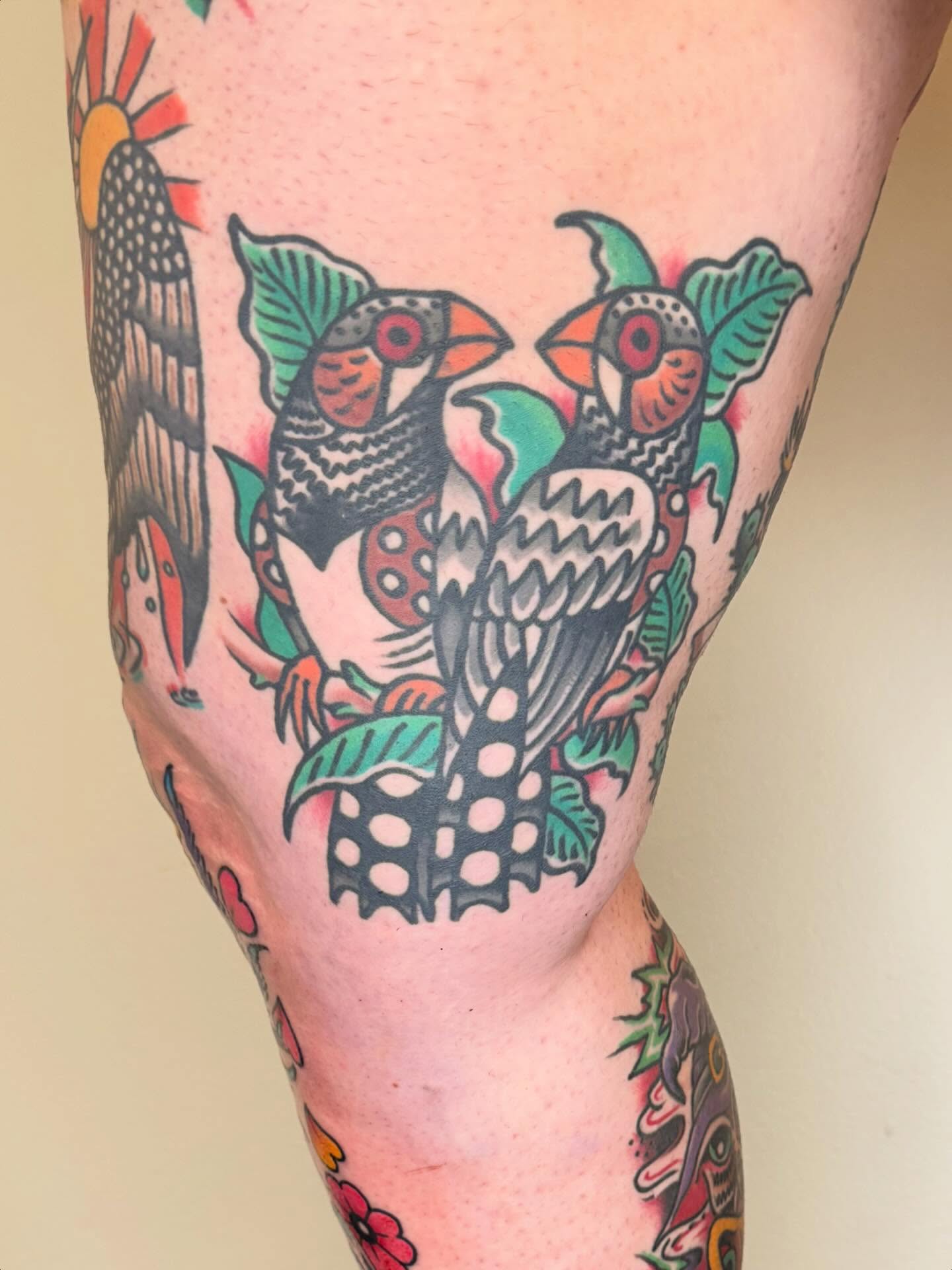Birds and leaves American traditional tattoo on the thigh by Matt Paw