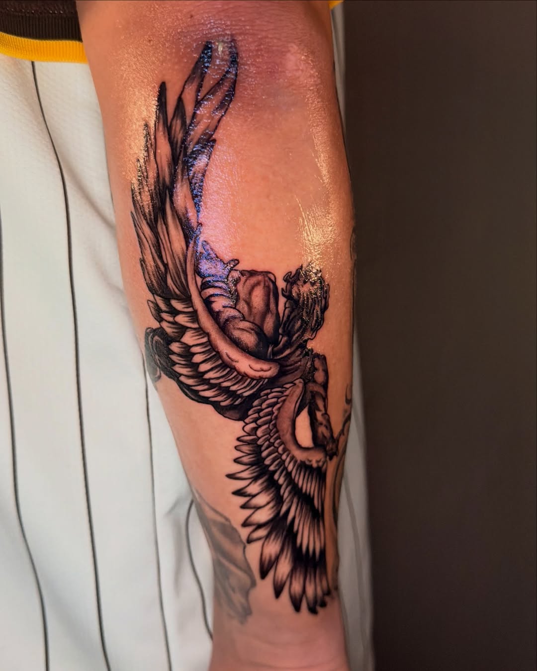 Angel with wings realism tattoo on the forearm by jayla pantig