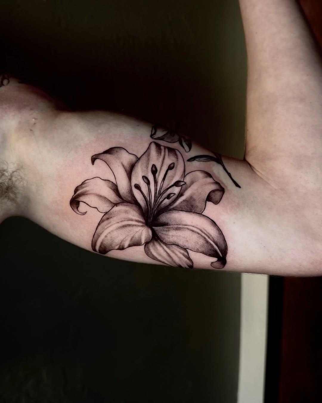 Lily flower fine line tattoo on the forearm by jayla pantig