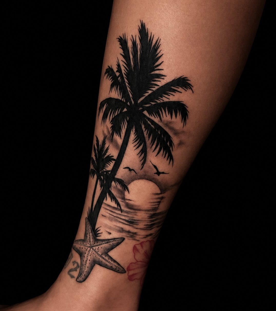 Palm trees and starfish realism tattoo on the forearm by Shane Boss, Toronto, Ontario