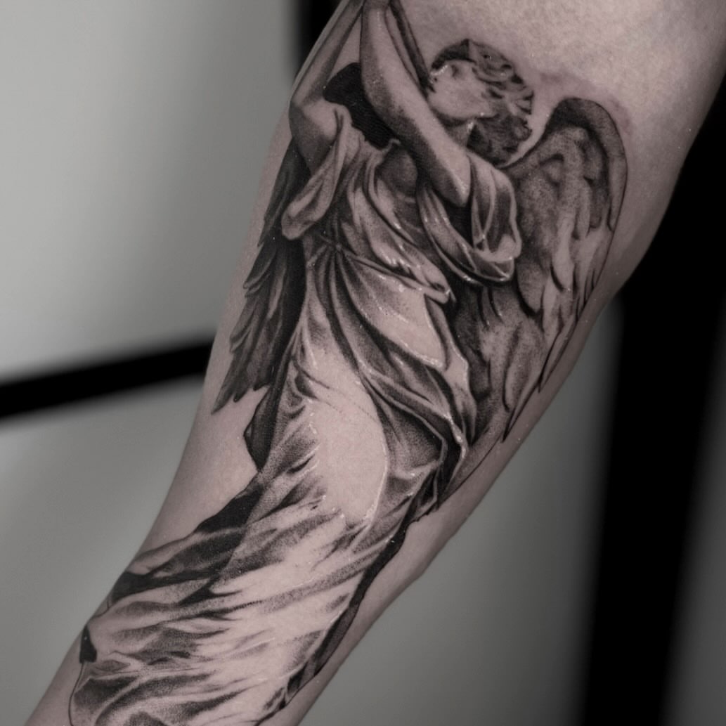 Tattoo by @micah_mariah — black_and_grey, realism