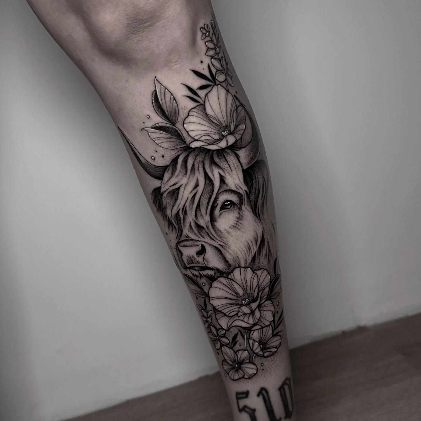 Lion and flowers realism tattoo on the forearm by ɪᴠᴏɴɴᴇ