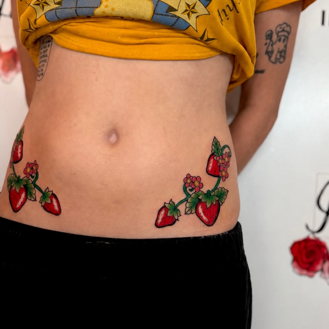 Strawberries new school tattoo on the torso by Tess