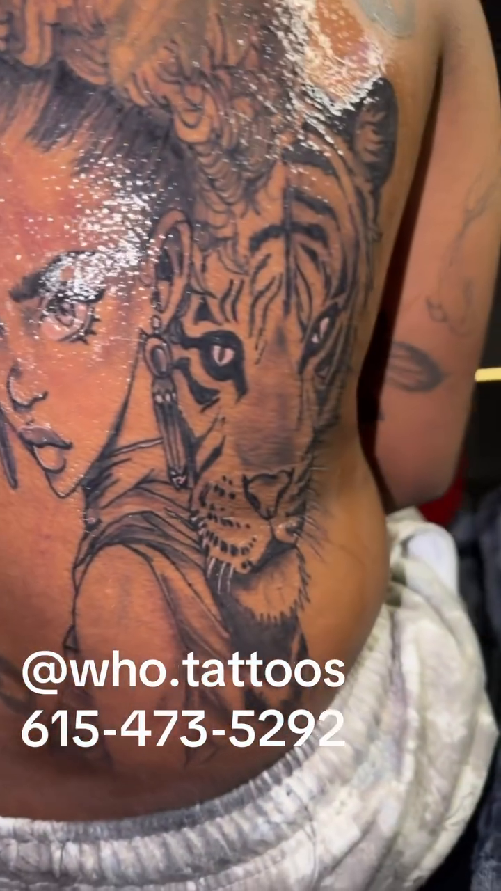 Realism tattoo on the torso by Marcus Carter