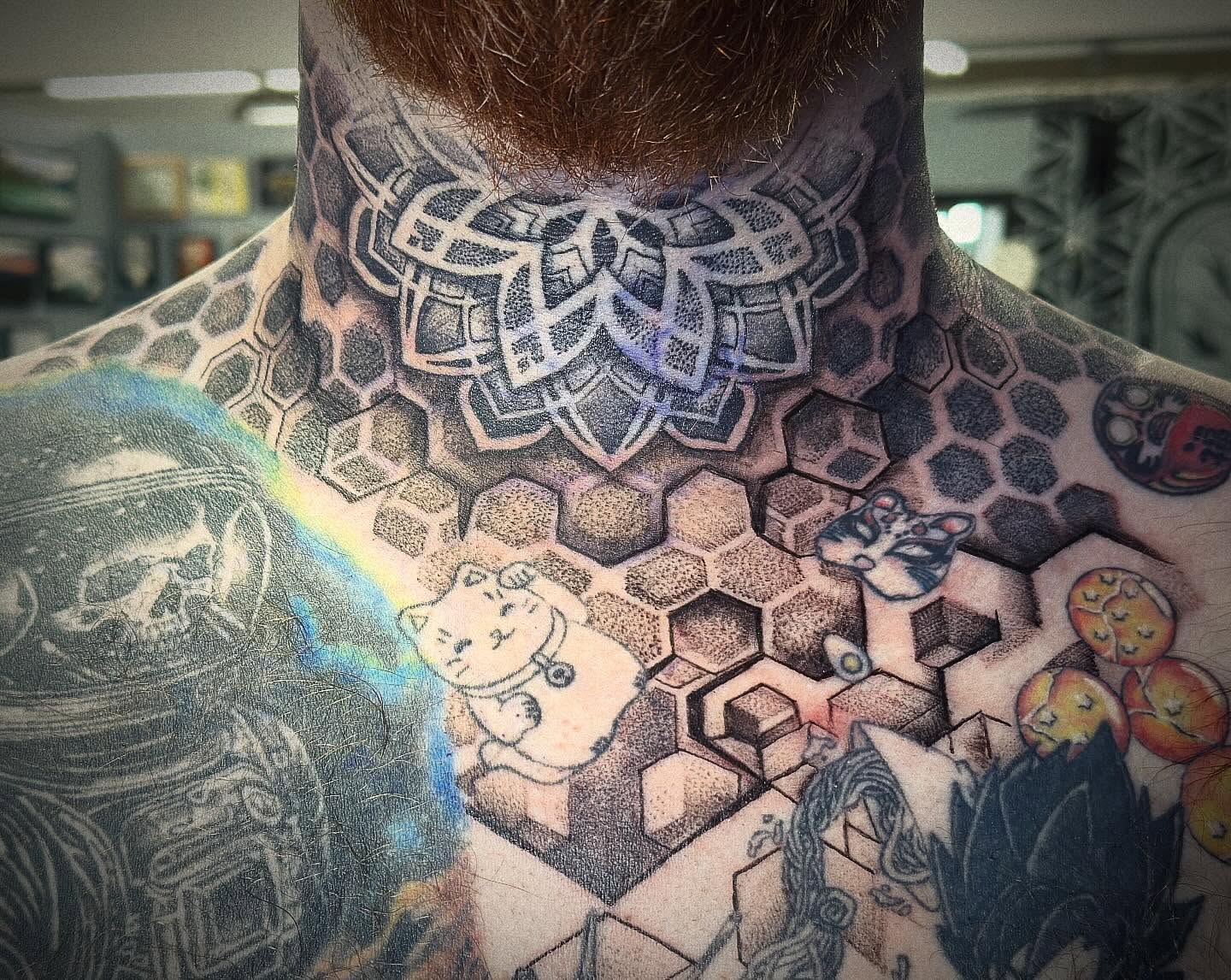 Tattoo by @tosh.pointo.tattoos — geometric