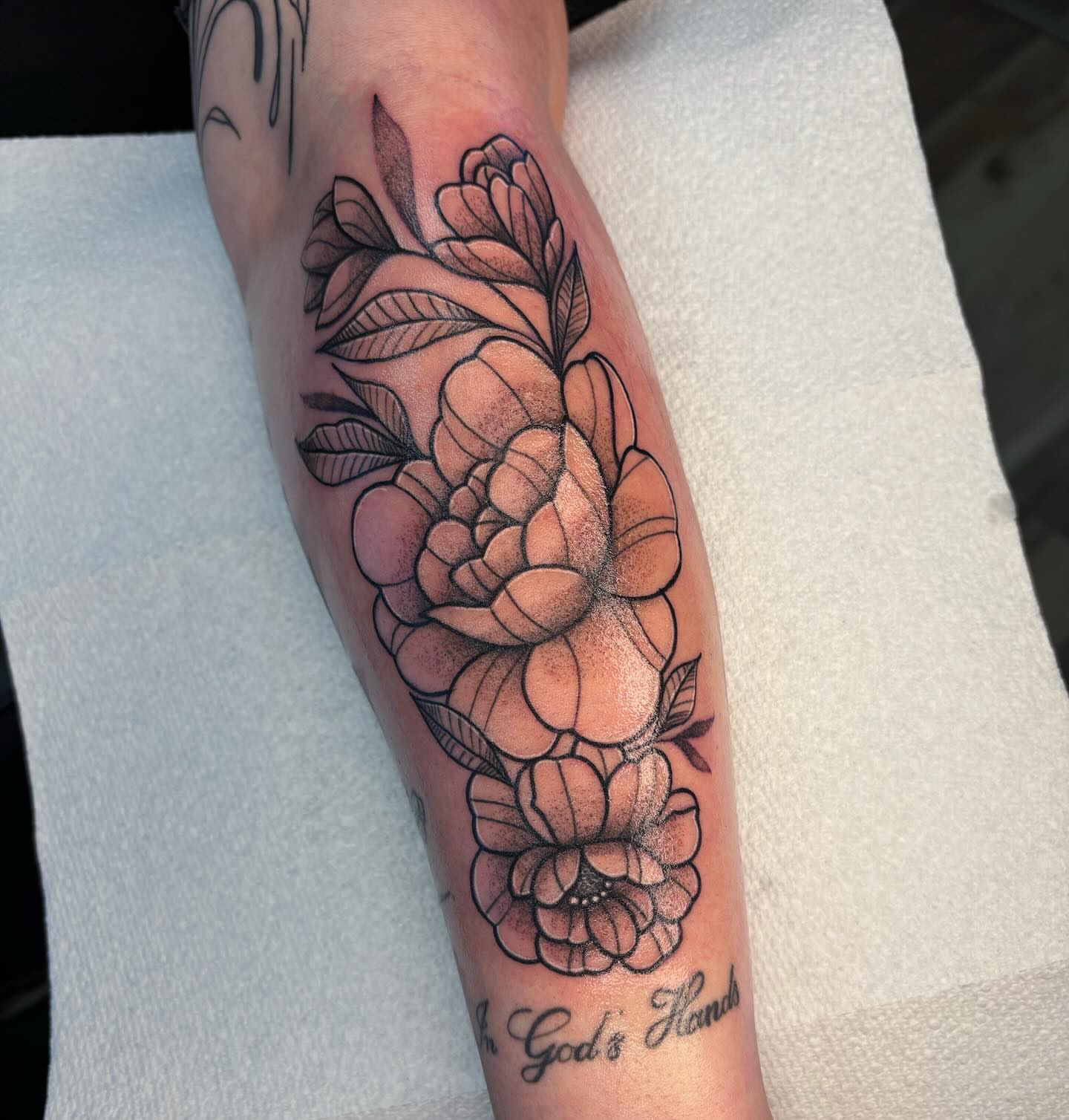 Flowers dotwork tattoo on the forearm by Demi Flores 🖤