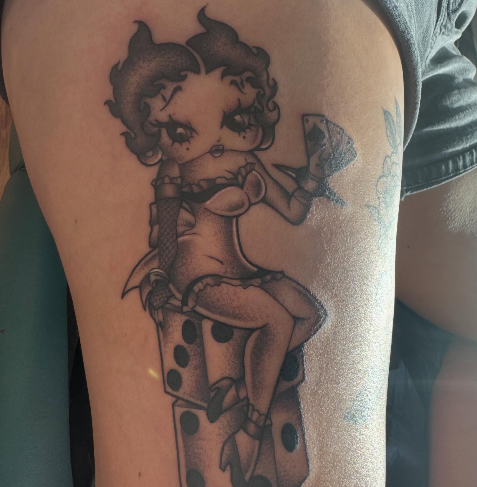 Betty Boop dotwork tattoo on the thigh by Tattoo, San Diego, California