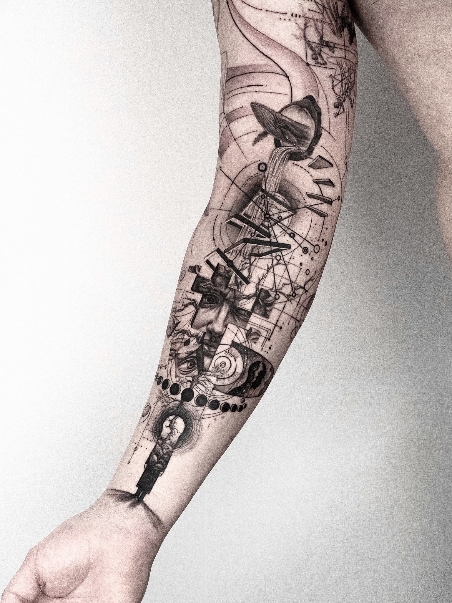 Abstract geometric design geometric tattoo on the forearm by János Bozóki, Budapest, Hungary