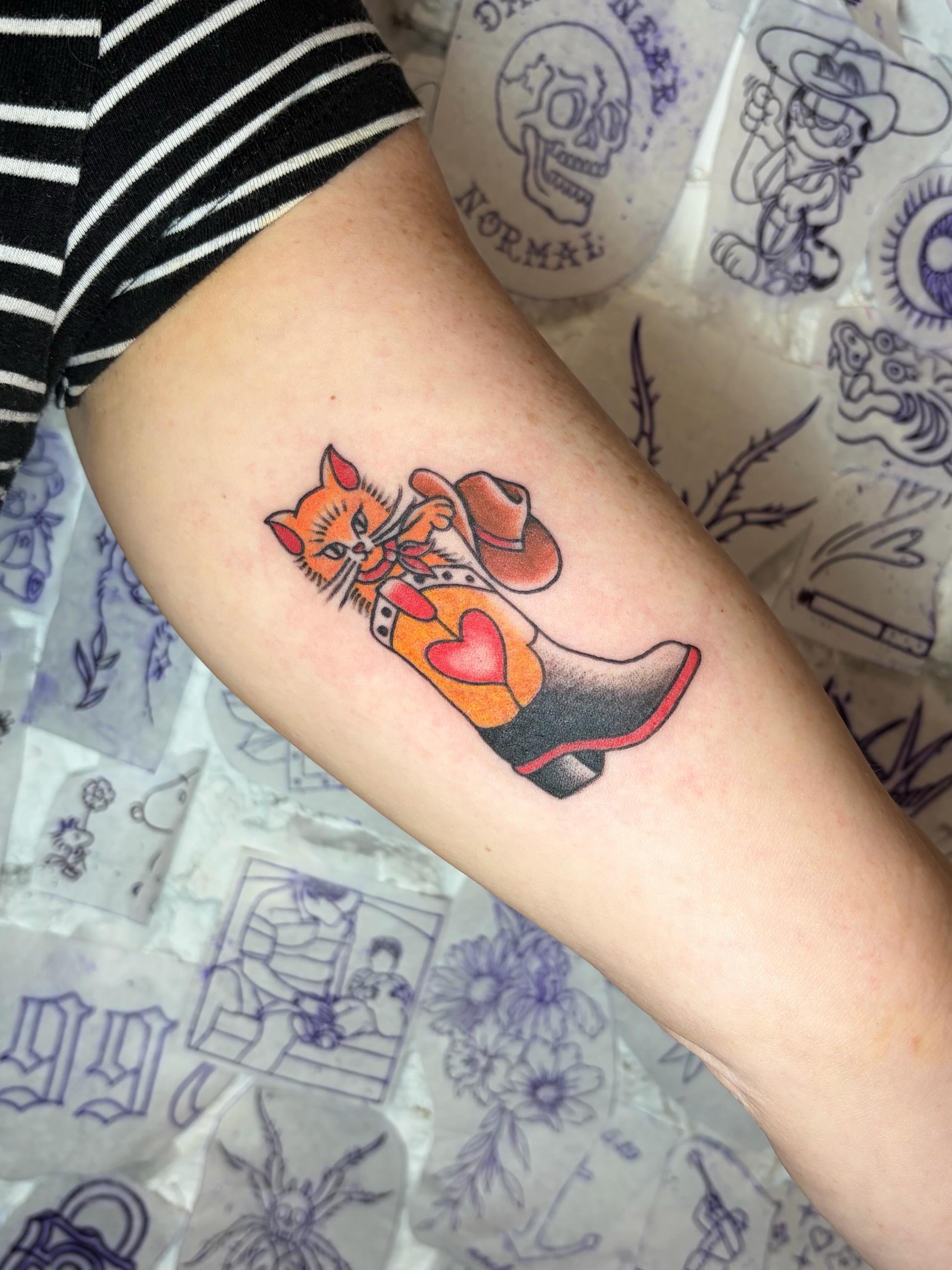 Cat in cowboy boot American traditional tattoo on the forearm by Danelle ✶ Nashville Tattooer