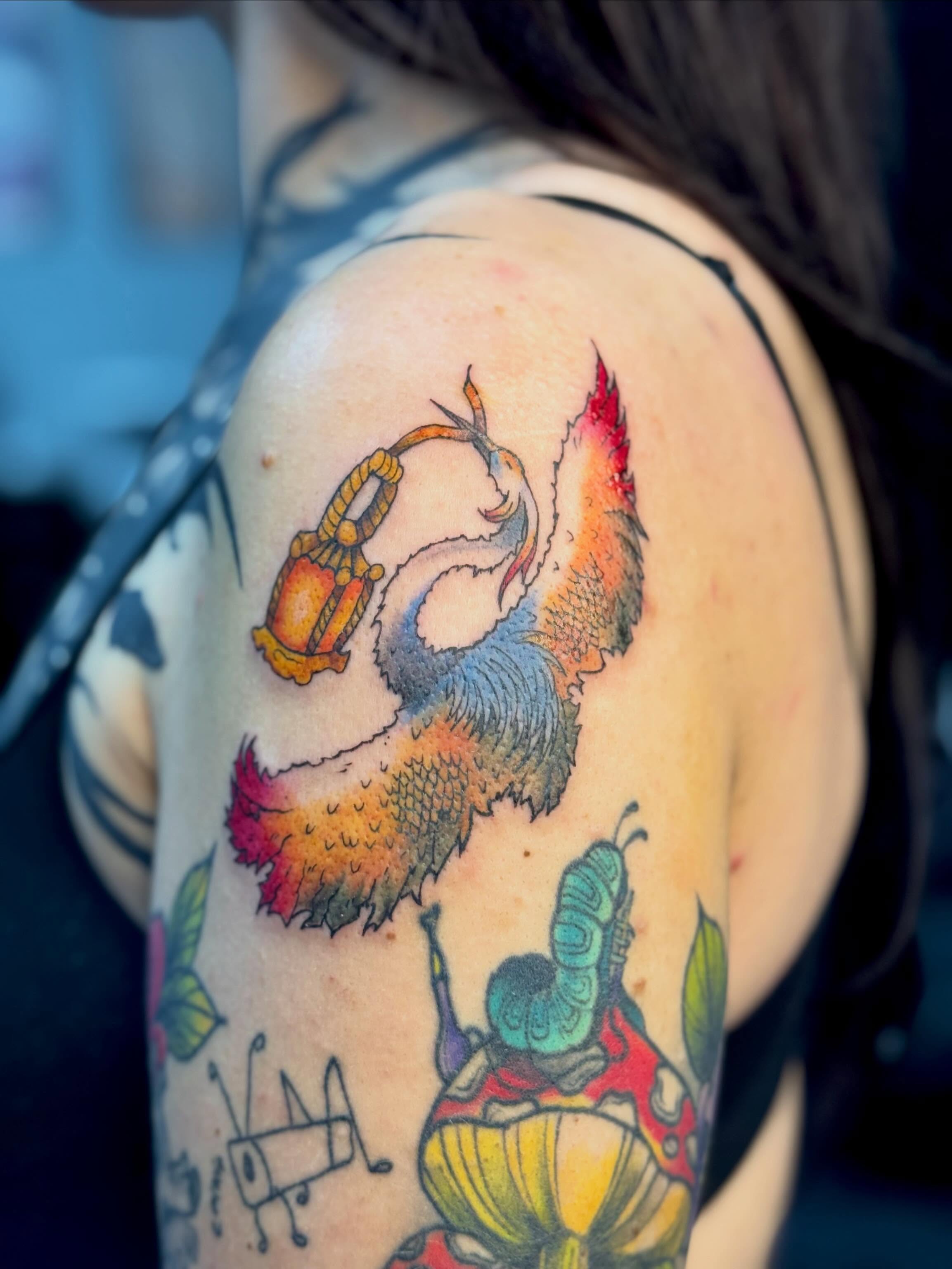 Rooster and lantern American traditional tattoo on the shoulder by Marie Amor🌙