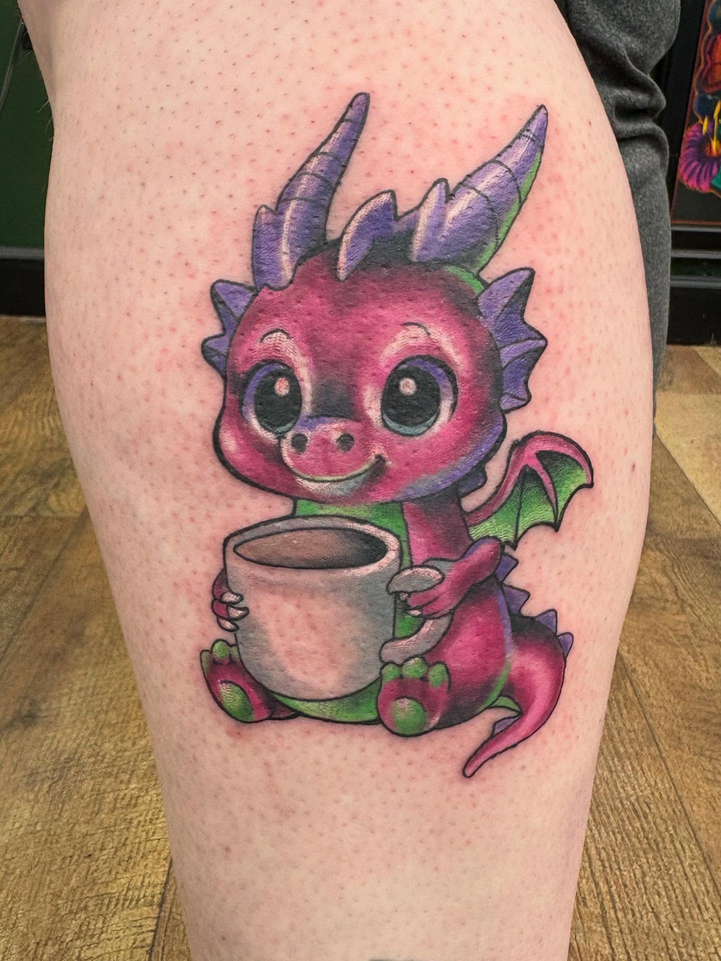 Baby dragon dotwork tattoo on the thigh by Robbie Reel, Wichita, Kansas