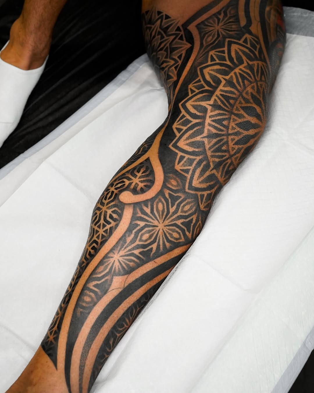 Tattoo by @rjxdots — geometric, blackwork
