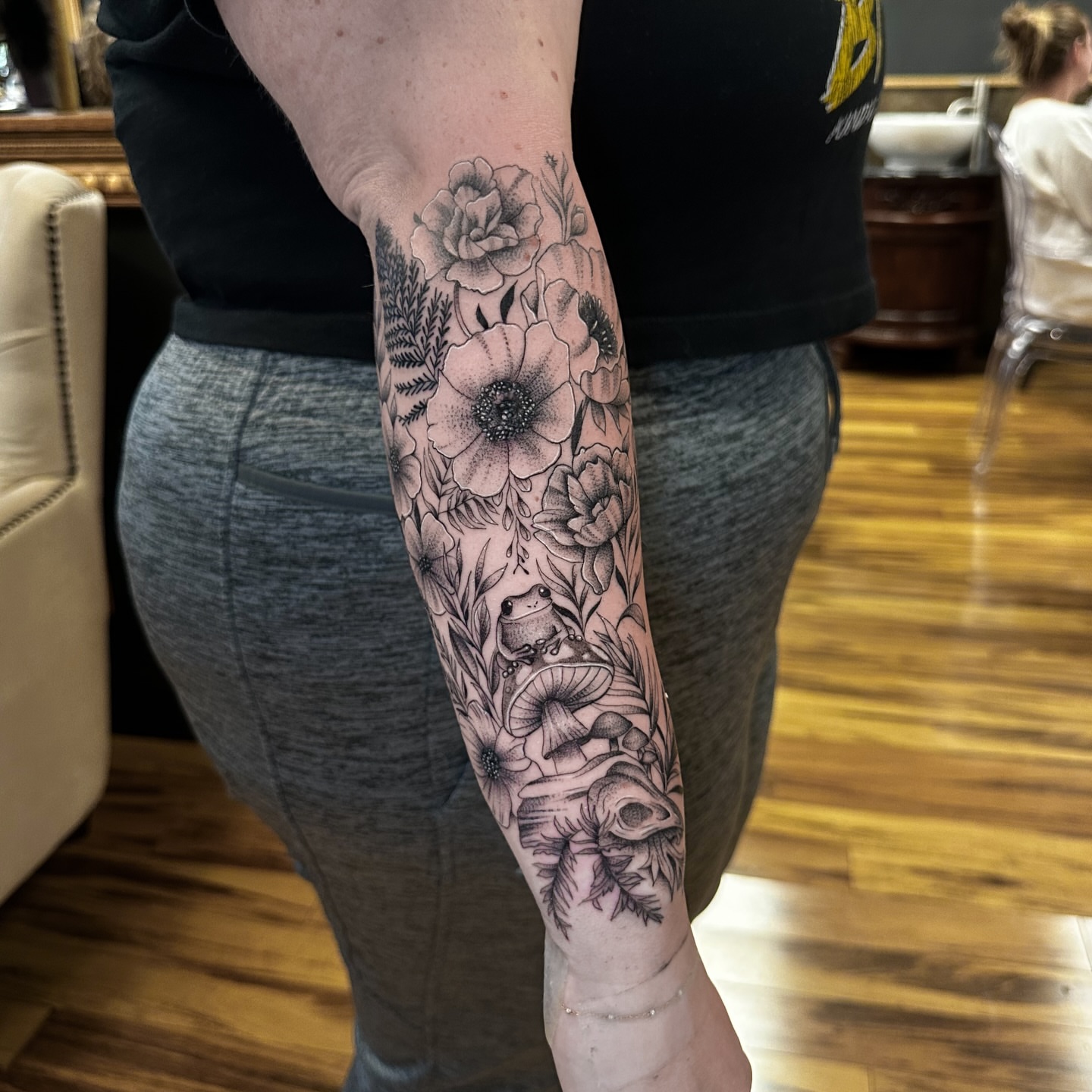 Floral and nature dotwork tattoo on the forearm by Leo Fernandes, Danvers, Massachusetts