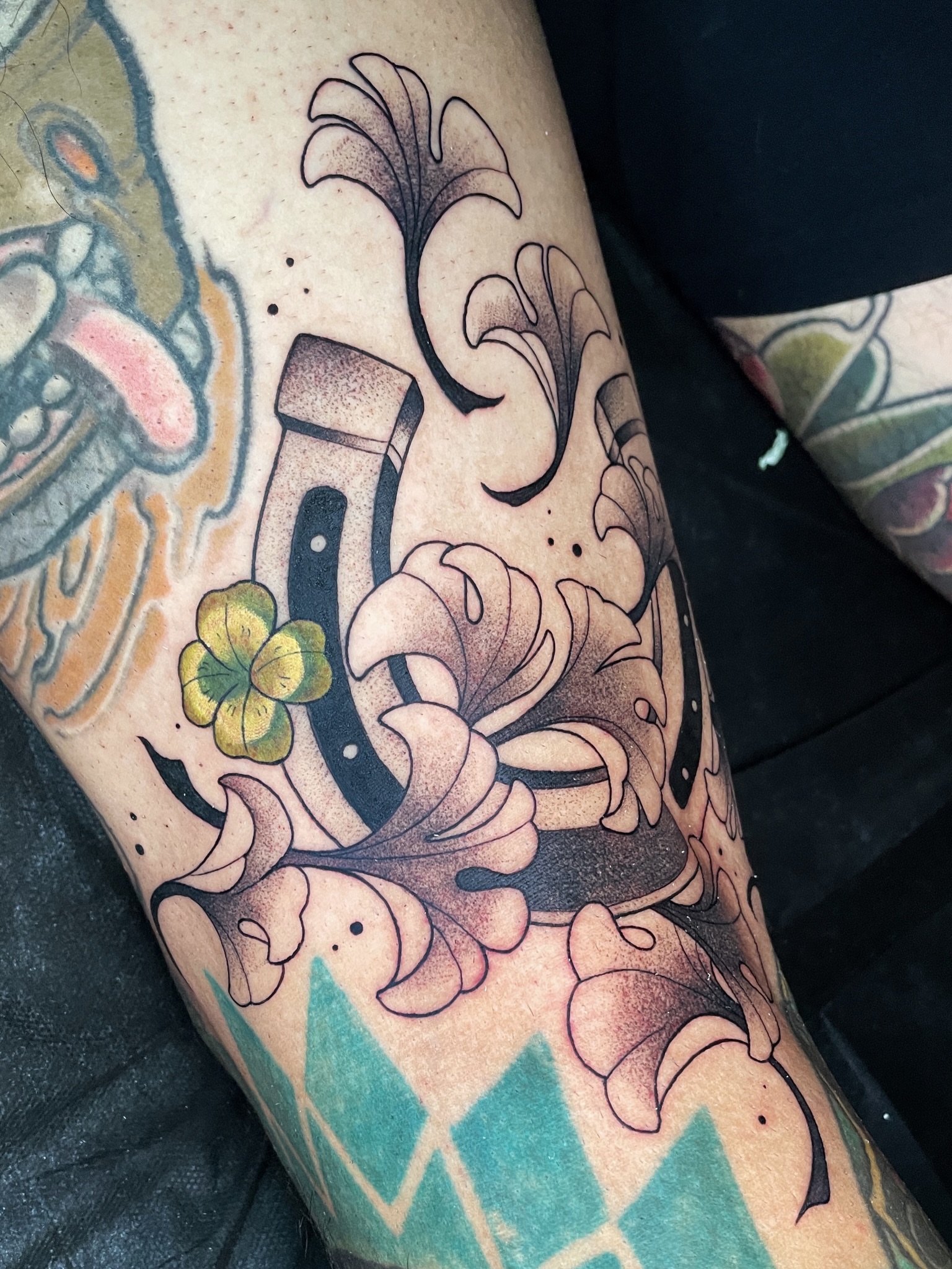 Floral arrangement American traditional tattoo on the forearm by zoey sage ✦