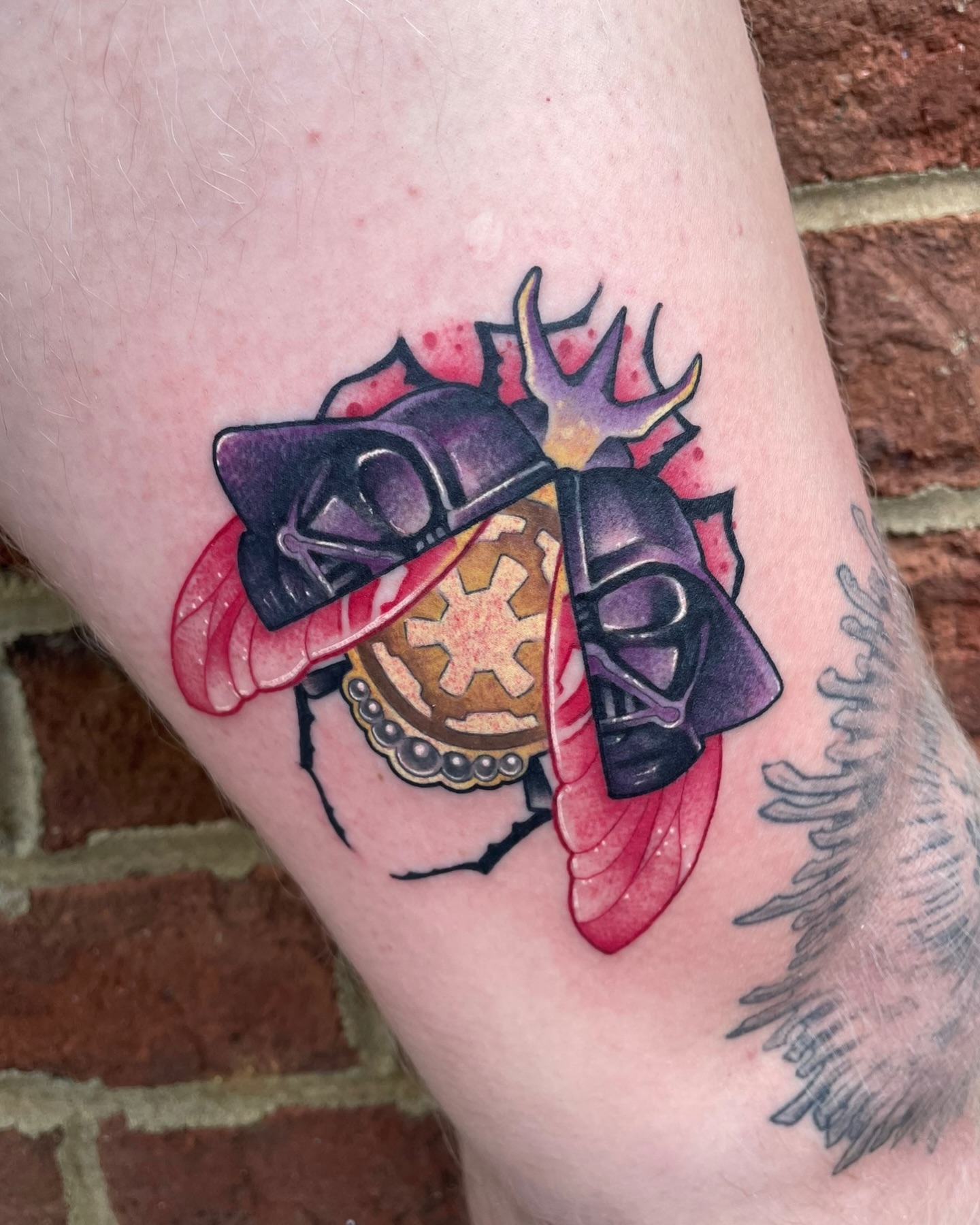 Darth vader beetle anime tattoo on the forearm by Sam Castro