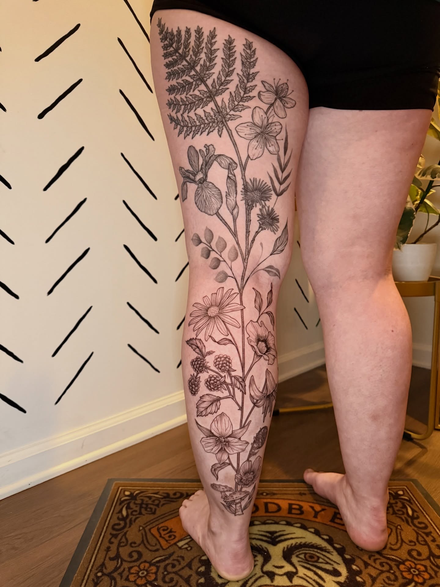 Botanical black and grey tattoo on the thigh by ππ£ππ€π₯π ππ¦ππ‘π, Lakewood, Colorado