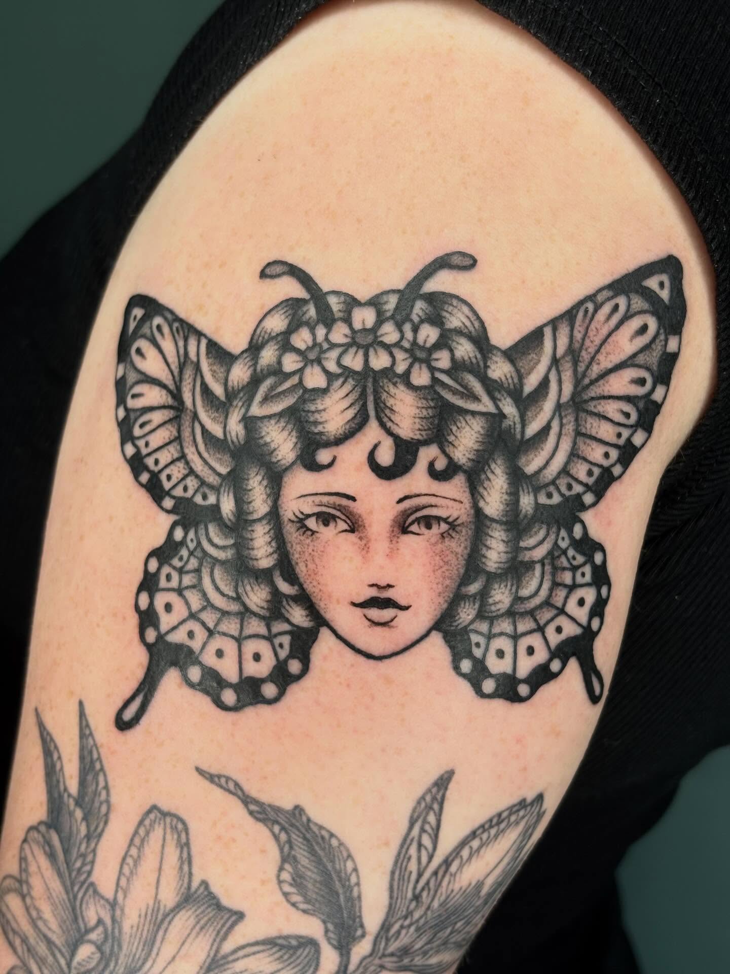 Butterfly woman illustrative tattoo on the shoulder by Sydney Pflaumer