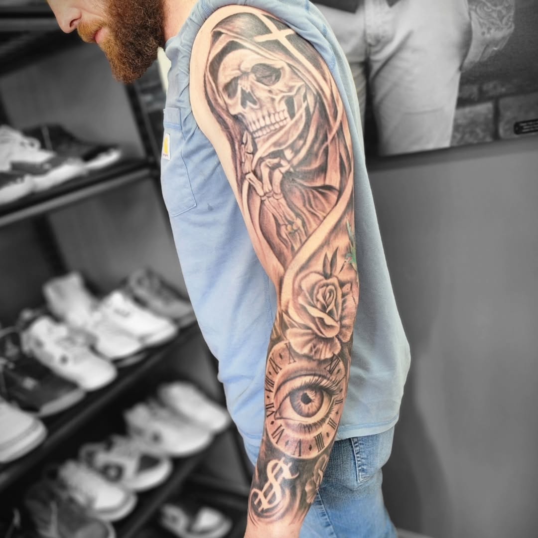 Realism tattoo on the forearm by Dennis Foust