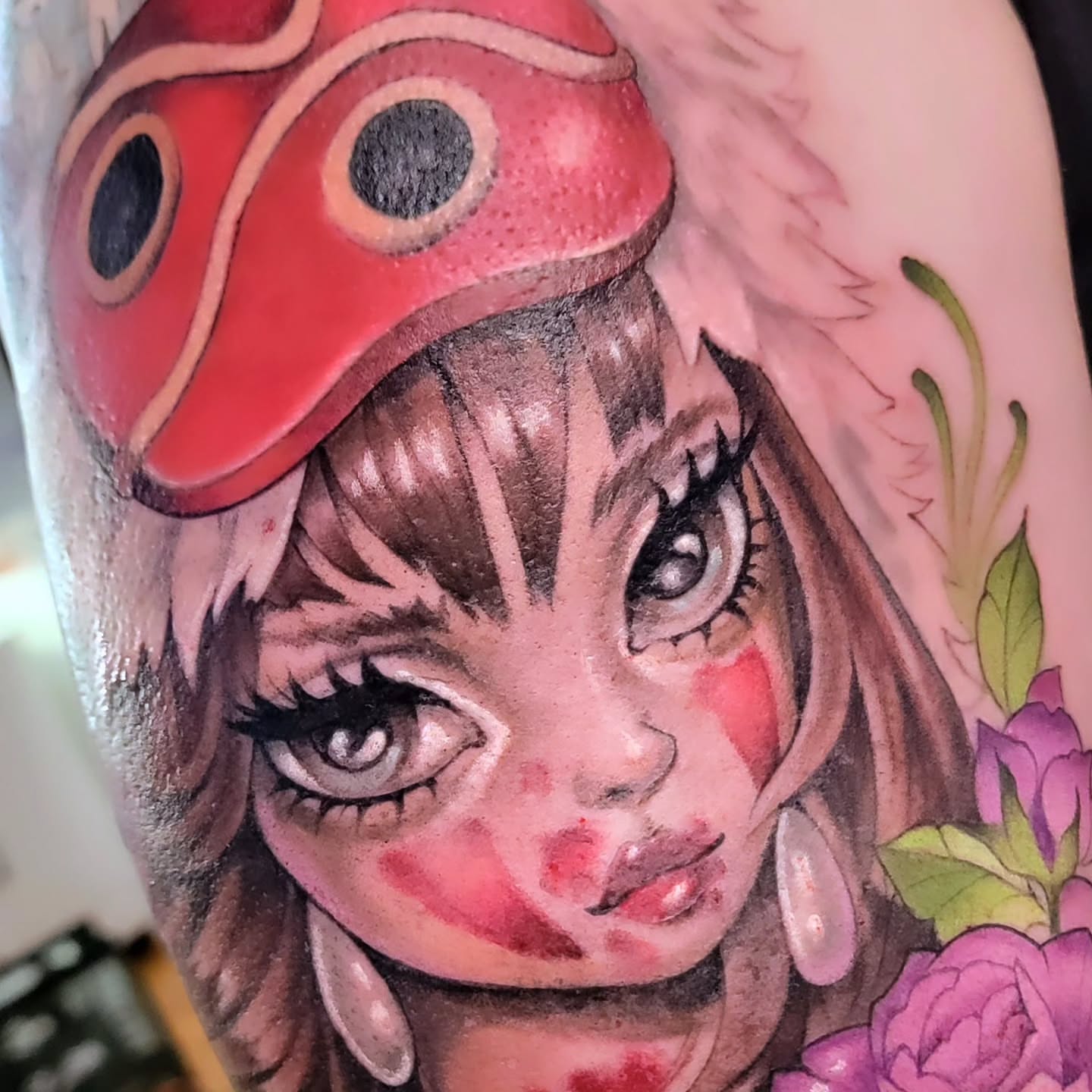 Girl with ladybug hat realism tattoo on the shoulder by Kerry Rose