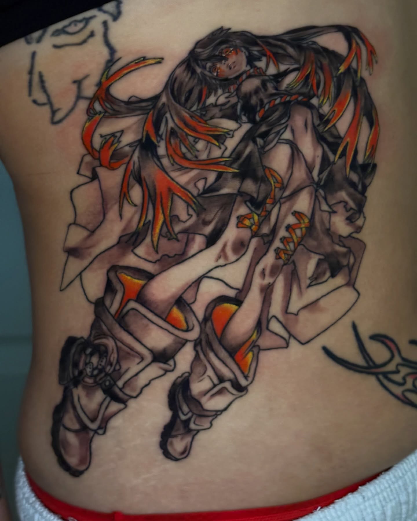 Anime character anime tattoo on the ribs by Callum