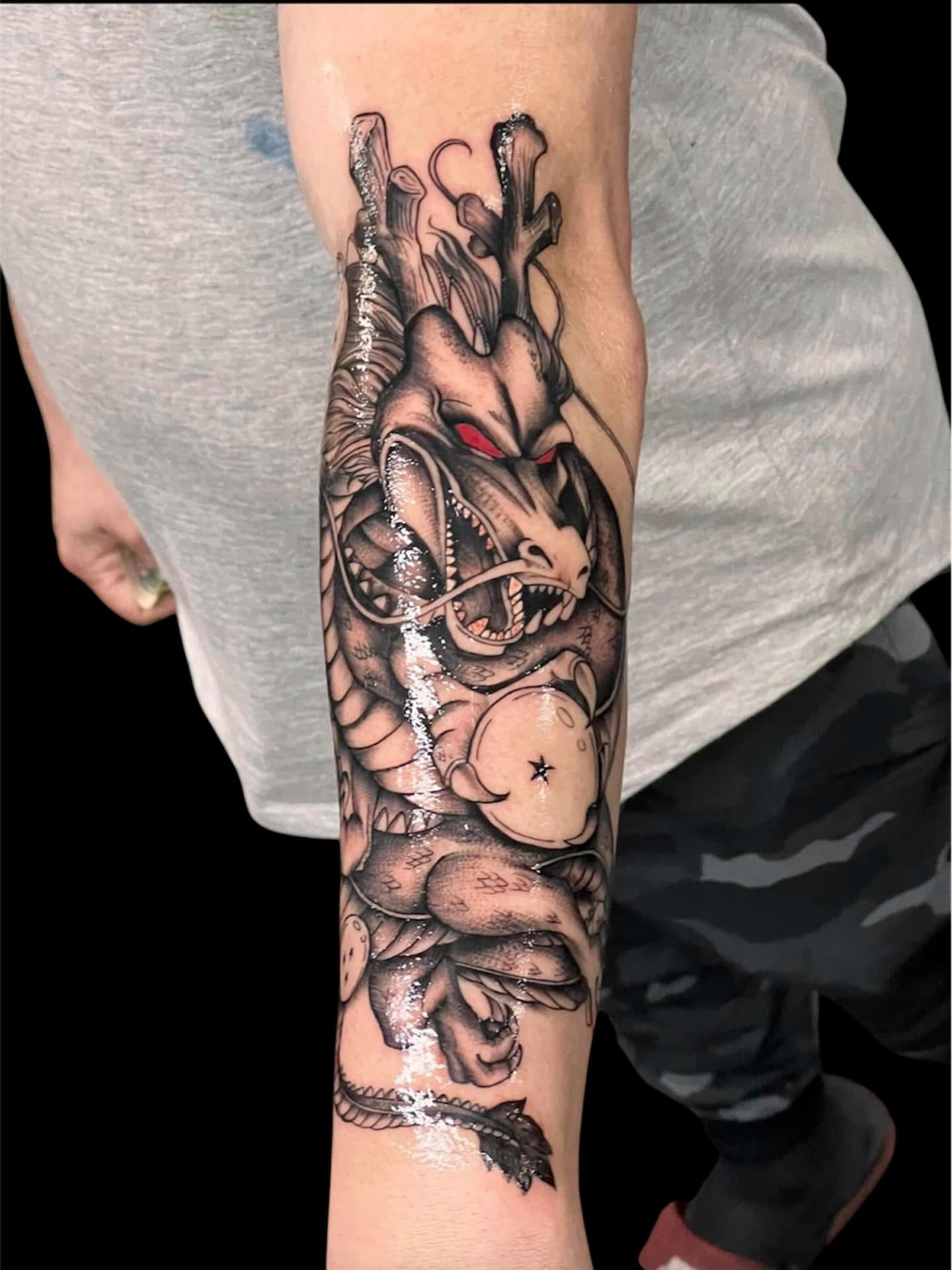 Dragon American traditional tattoo on the forearm by Tattoomobile