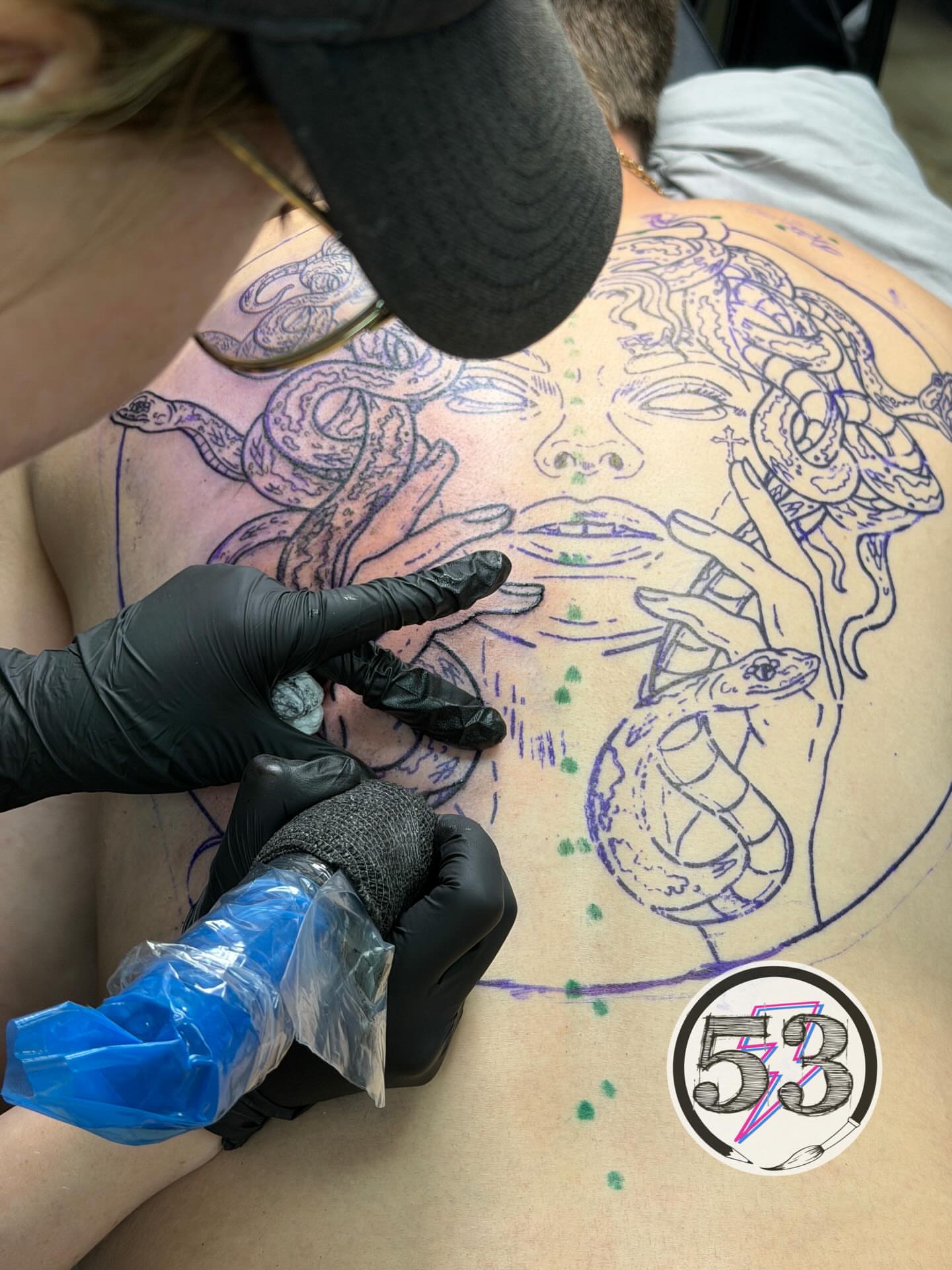 Face with mushrooms and snakes neo-traditional tattoo on the back by SHOP53 Tattoo & Art