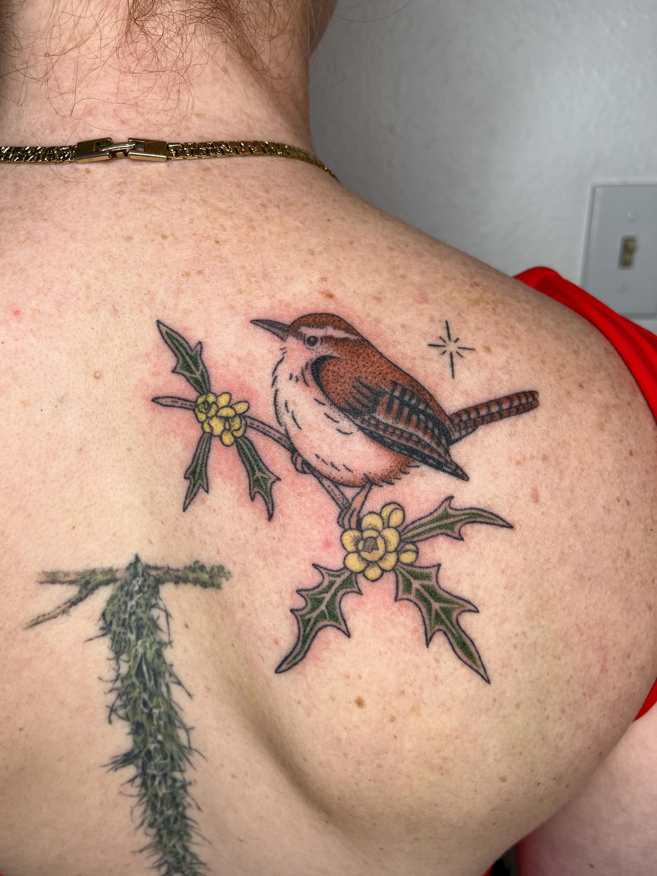 Bird and holly American traditional tattoo on the shoulder by natalie
