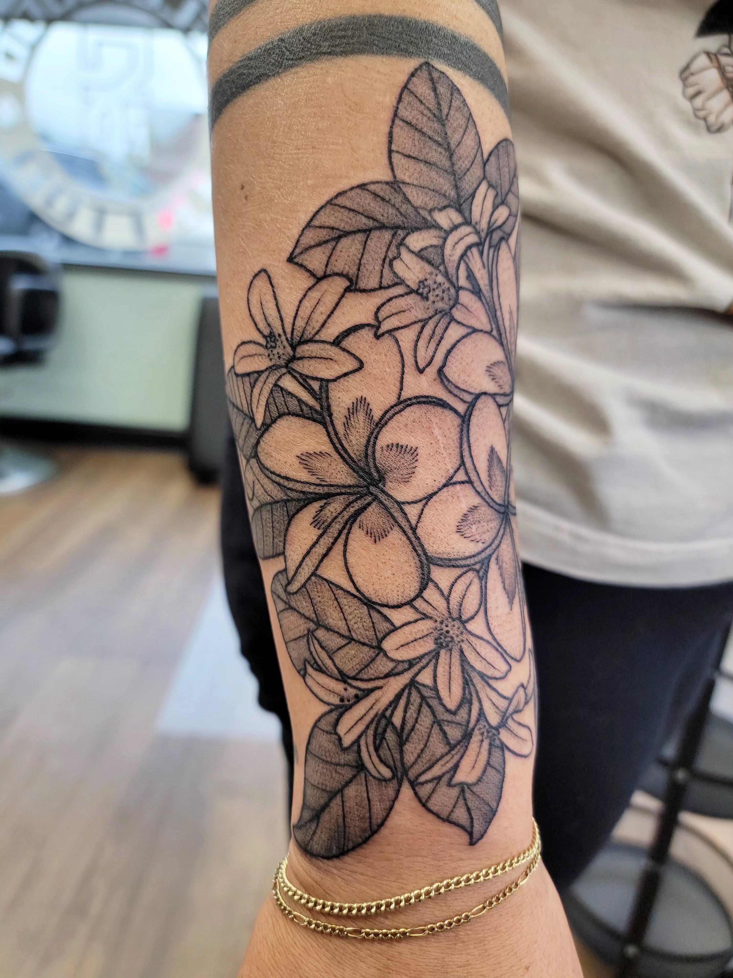 Flower bouquet black and grey tattoo on the forearm by Chantel Chan, Portland, Oregon