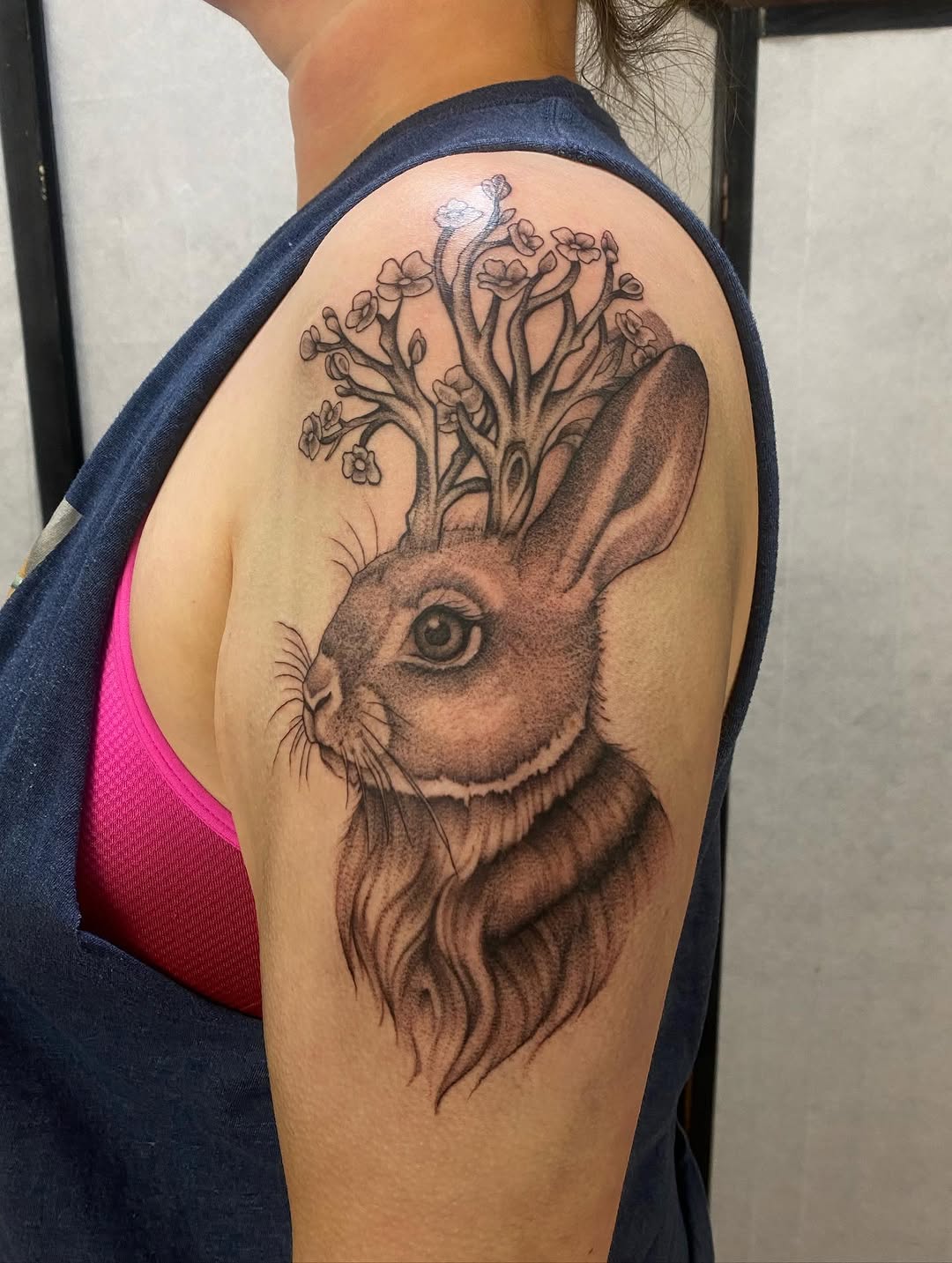 Rabbit with blooming branches fine line tattoo on the shoulder by Alexandra Carroll ♡