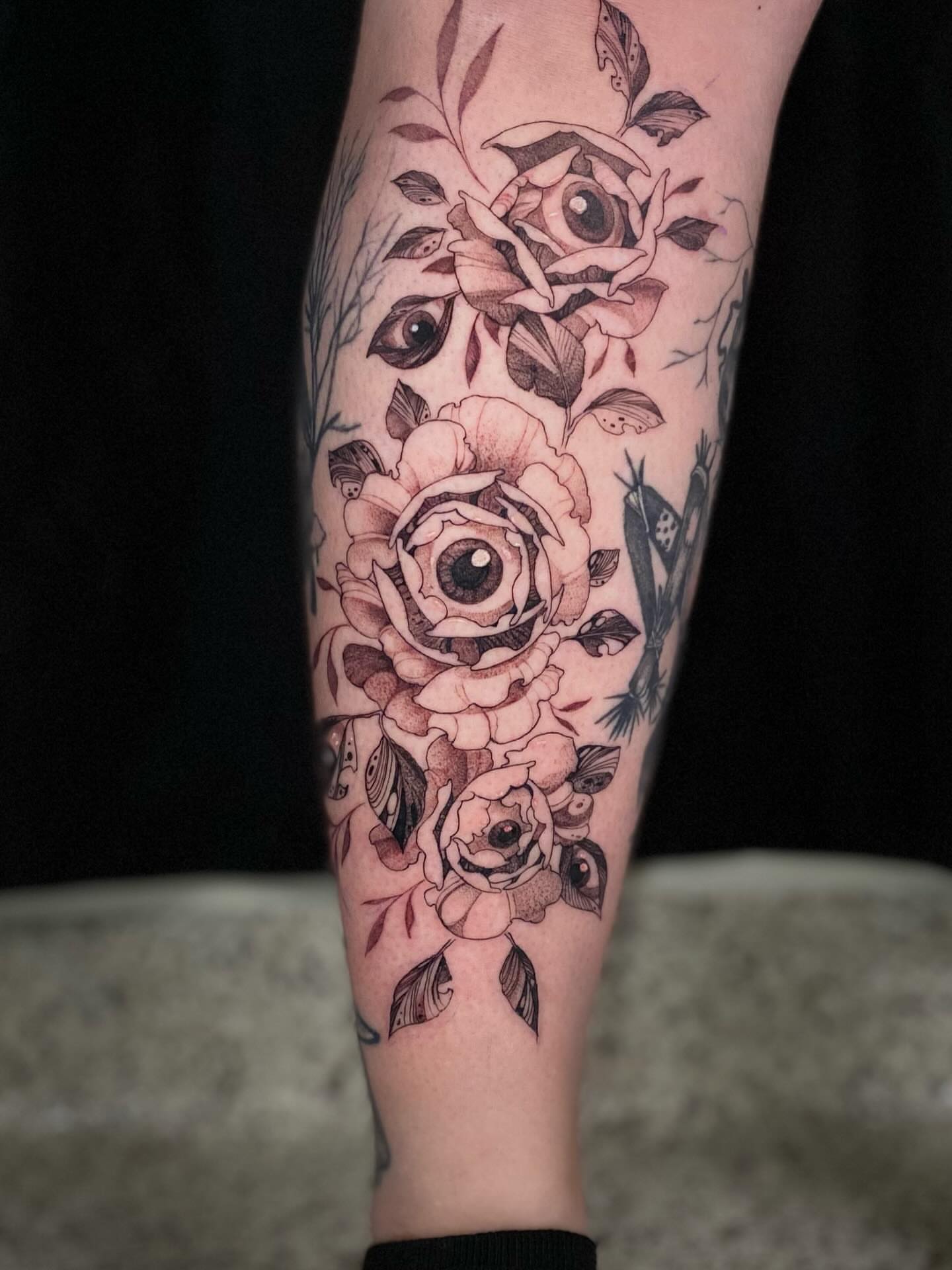 Roses black and grey tattoo on the forearm by Olivia Scott - Kansas Tattoo Artist