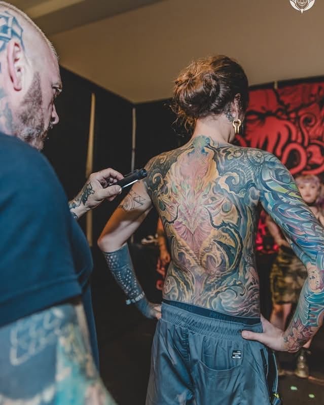 Full back piece new school tattoo on the back by Jordan Rookus