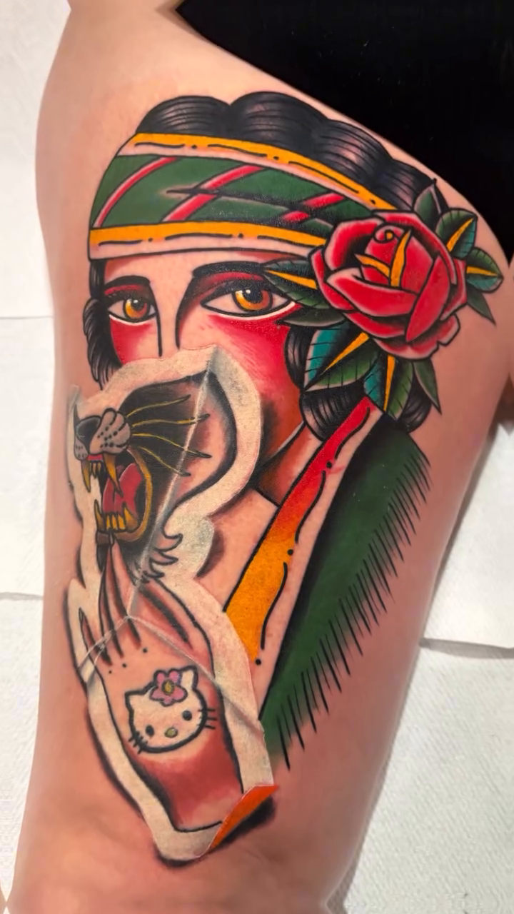Woman with panther and rose neo-traditional tattoo by Massimiliano pennella