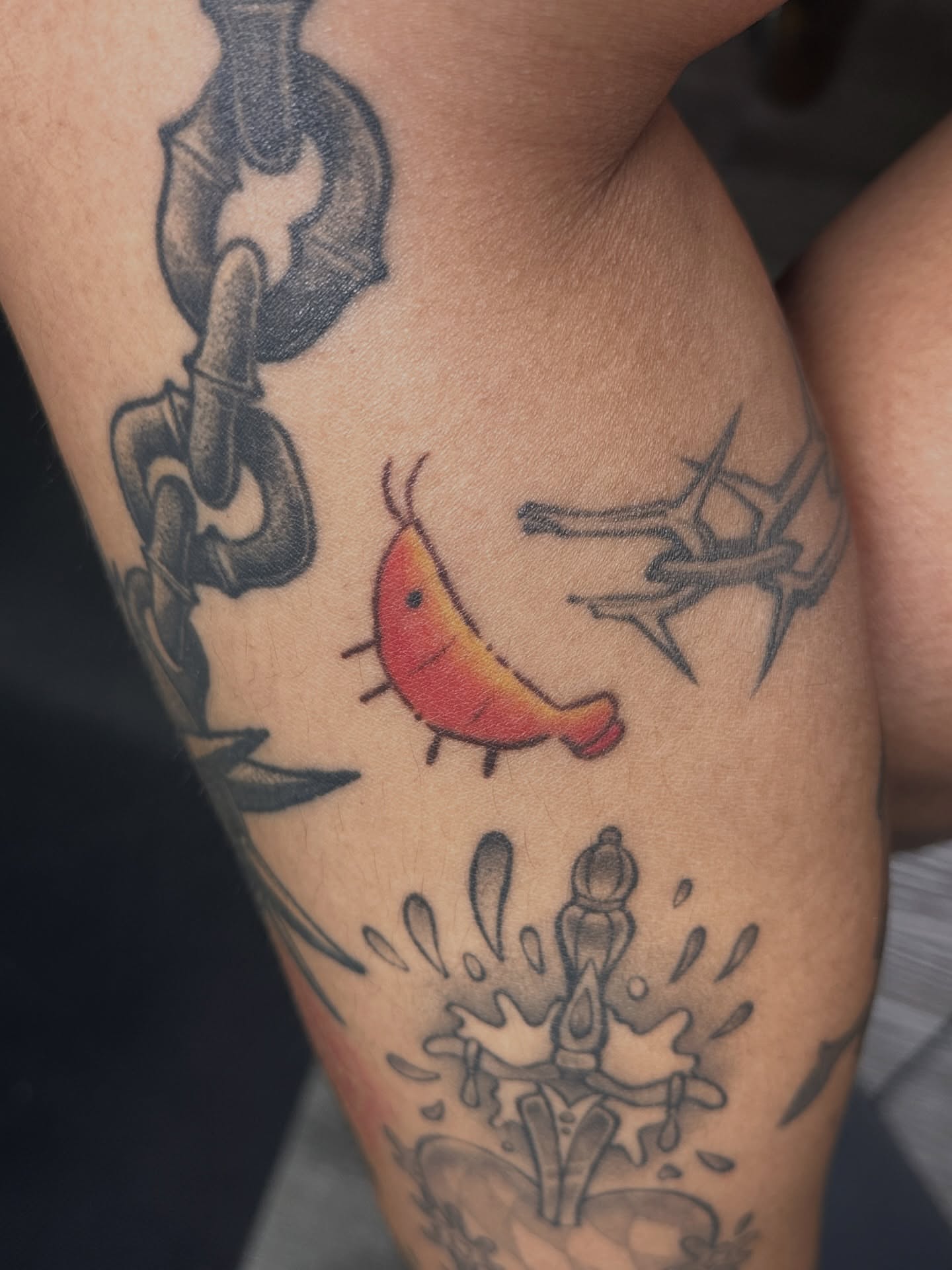 Shrimp and barbed wire American traditional tattoo on the thigh by Shrimple