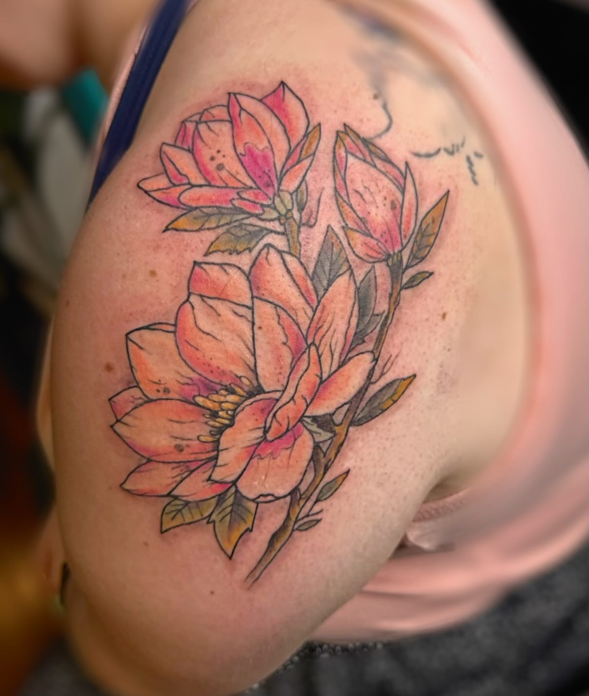Magnolia flowers realism tattoo on the shoulder by @brocks_tatt_attic_, New Orleans, Louisiana