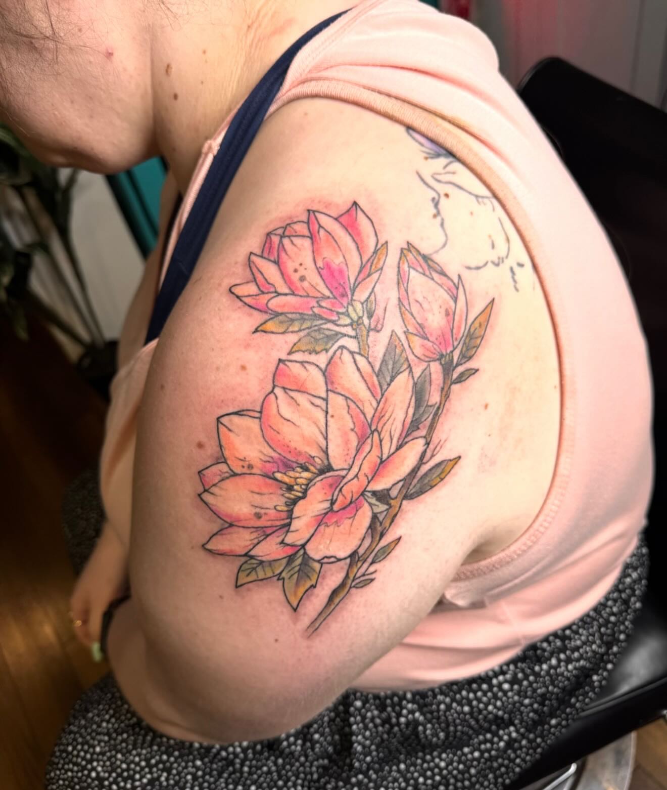 Flowers watercolor tattoo on the shoulder by @brocks_tatt_attic_, New Orleans, Louisiana