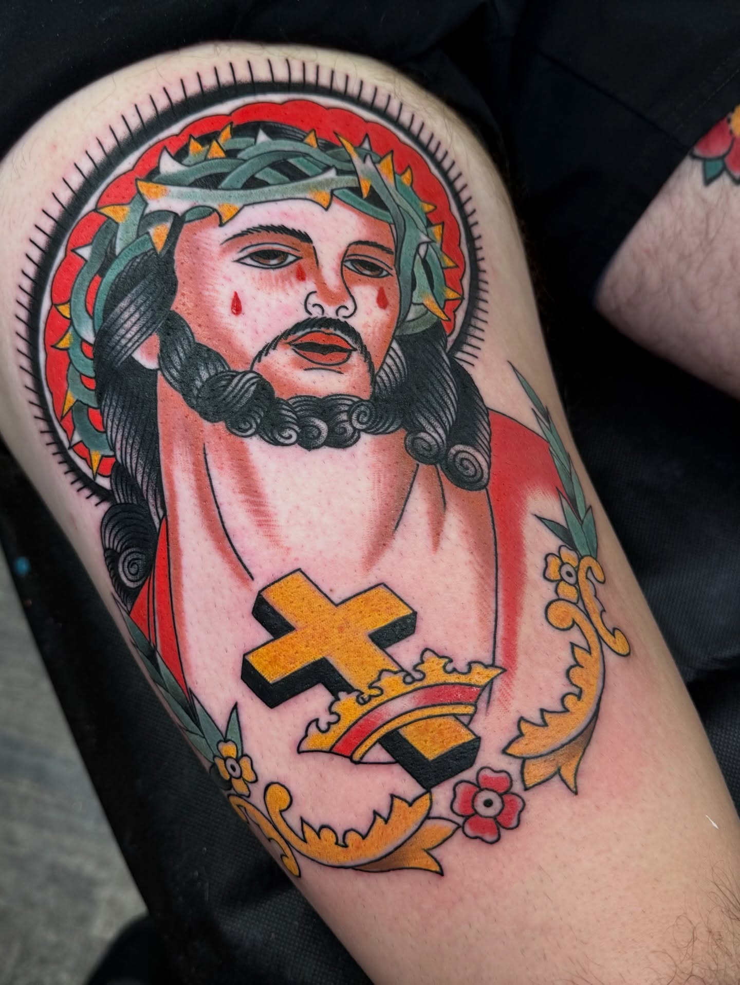 Religious figure American traditional tattoo on the thigh by Landon Lewis