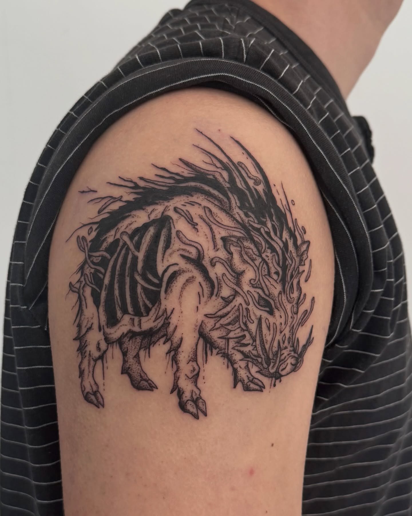 Dragon black and grey tattoo on the shoulder by jake.inks